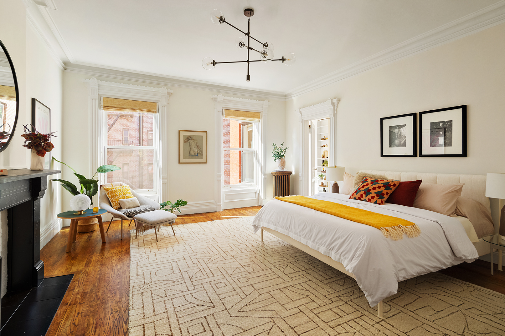 22 8th Avenue, Unit 3 Brooklyn, NY 11217 - Photo 7 of 14 a bedroom with a bed and wooden floor