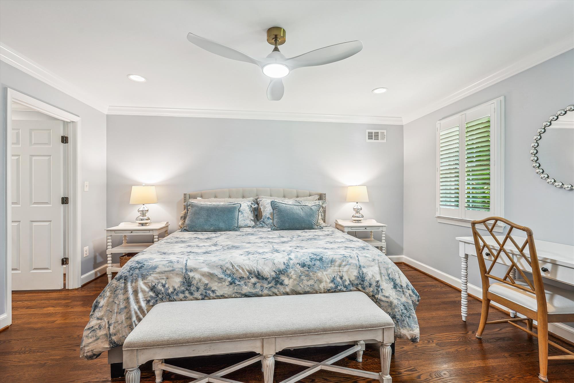 9904 Carter Road Bethesda, MD 20817 - Photo 20 of 41 a bedroom with a bed and wooden floor