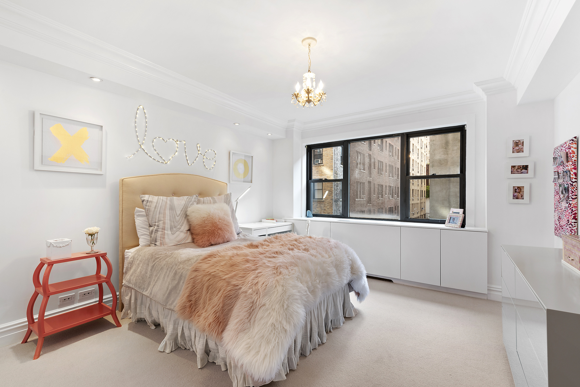 165 East 72nd Street, Unit 3L Manhattan, NY 10021 - Photo 6 of 13 a bedroom with a large bed and a window