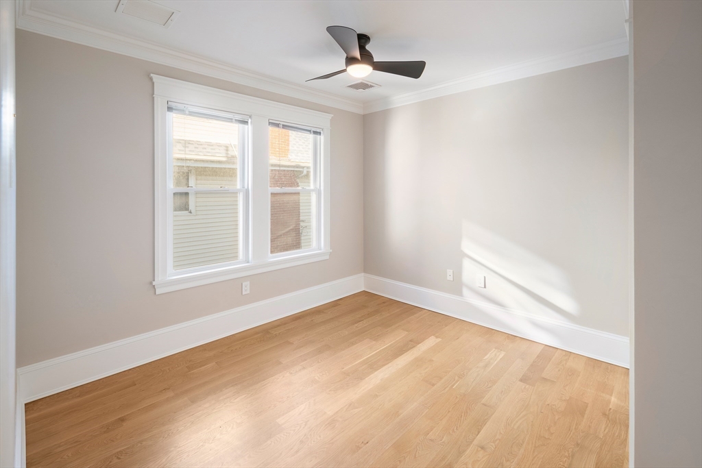 48-50 Amsden Street, Unit 2 Arlington, MA 02474 - Photo 15 of 34 an empty room with a window