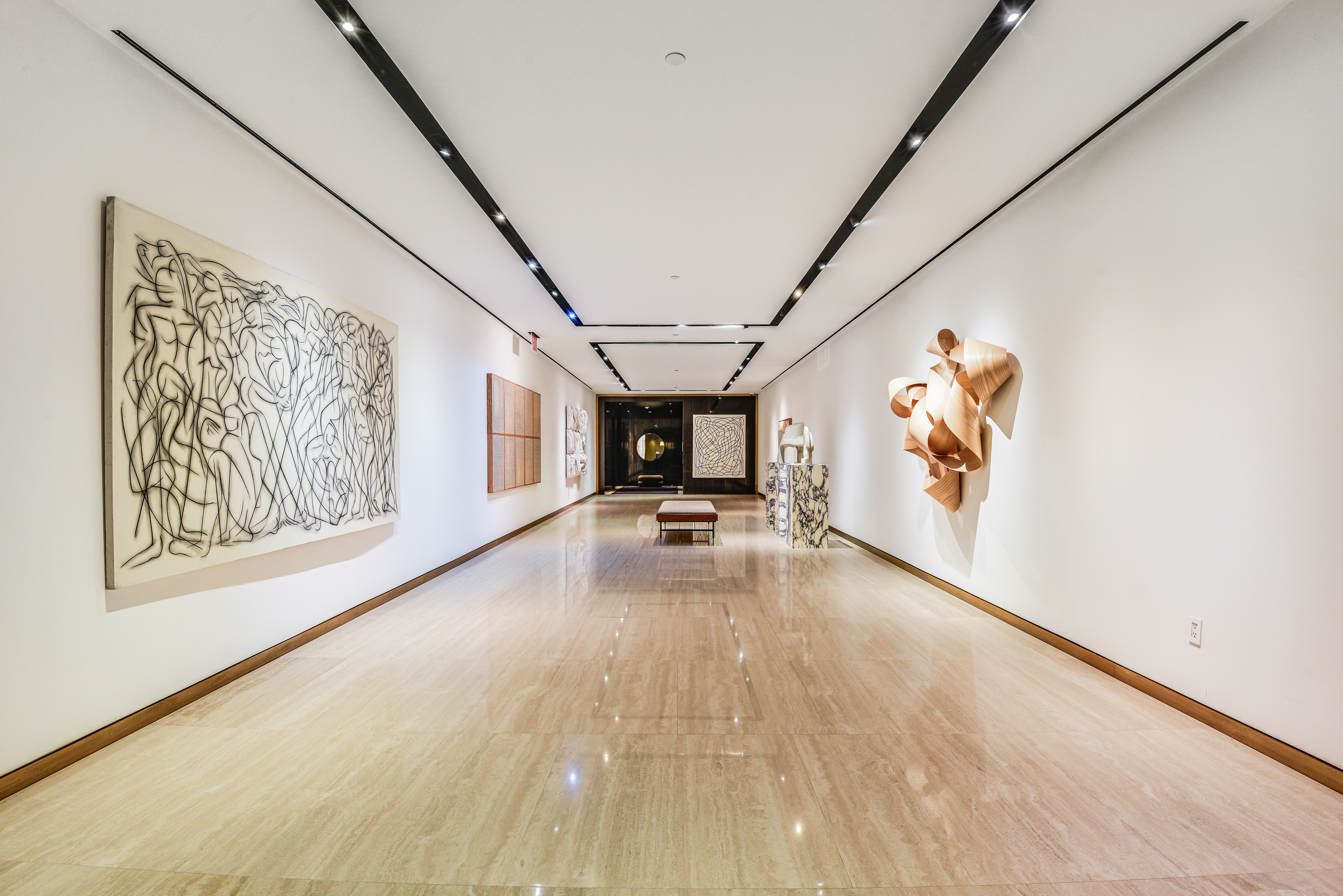 505 West 19th Street, Unit 7W Manhattan, NY 10011 - Photo 28 of 31 a view of a hallway with wooden floor