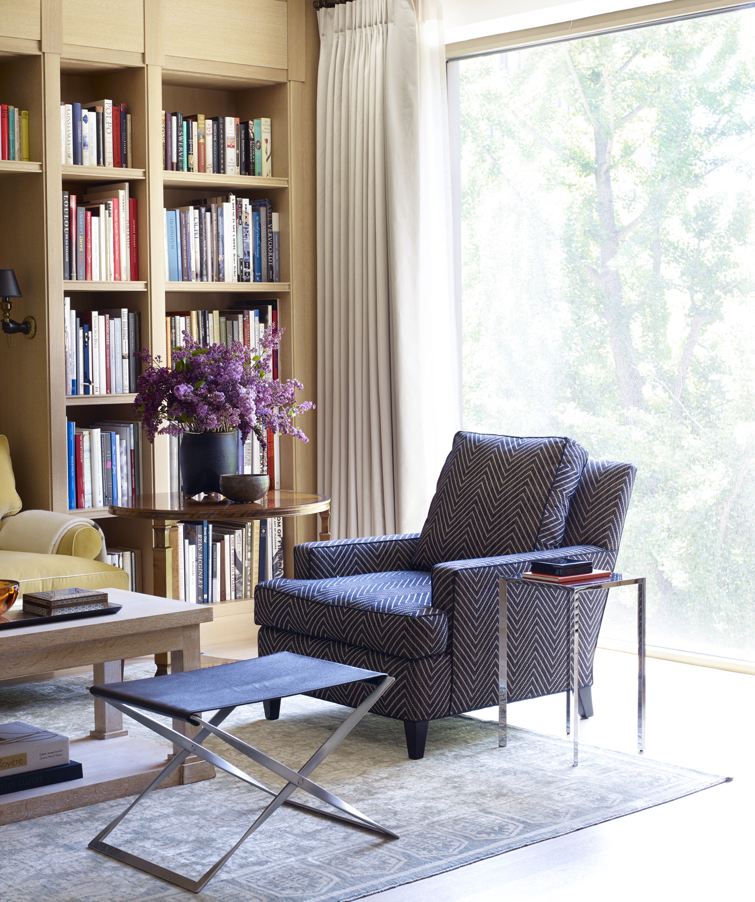 50 Gramercy Park North, Unit 5A Manhattan, NY 10010 - Photo 2 of 10 a living room with furniture and a book shelf