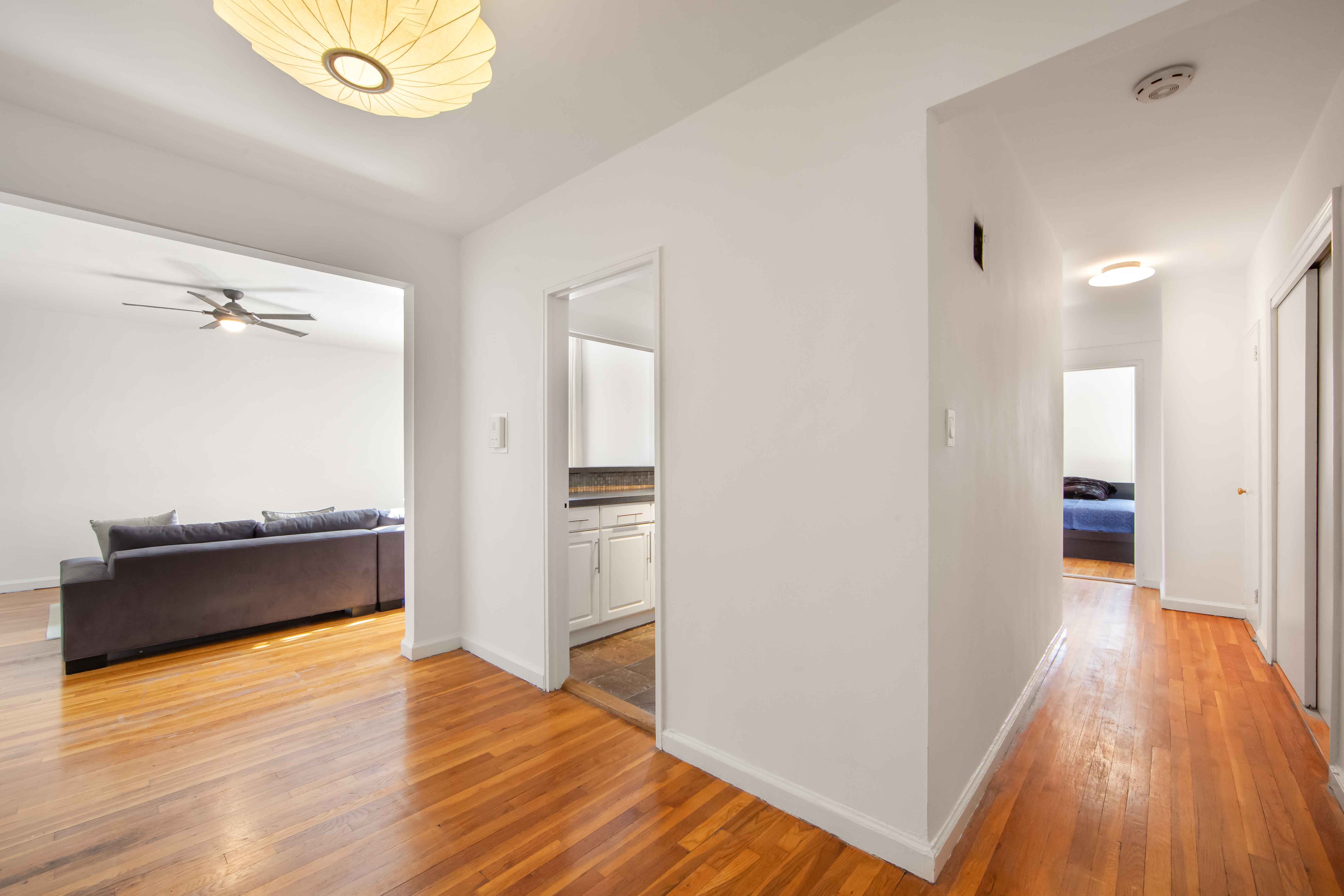 100 Ocean Parkway, Unit 3G Brooklyn, NY 11218 - Photo 7 of 12 a view of a room with wooden floor and cabinet