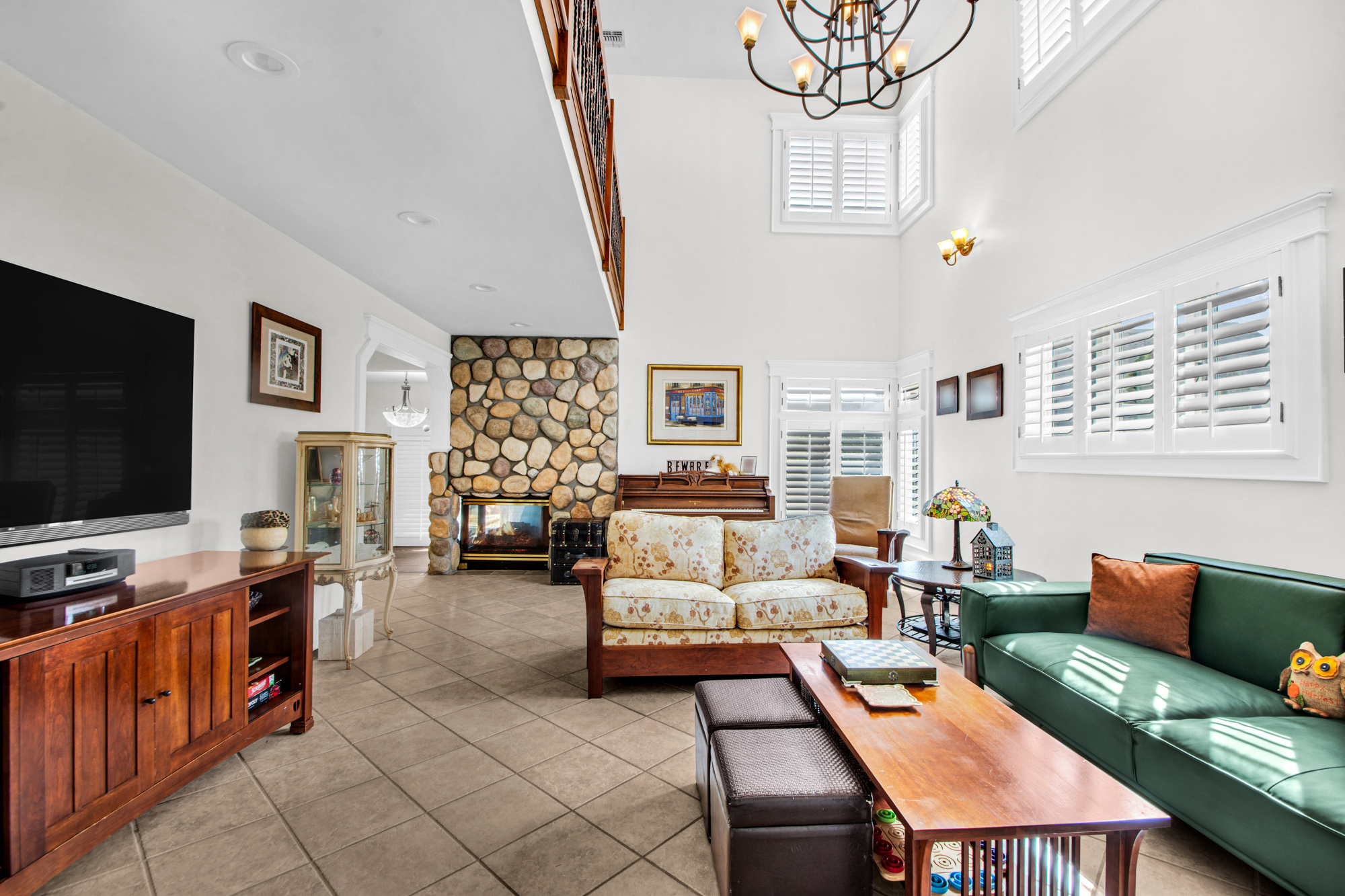 165 Swaim Avenue Staten Island, NY 10312 - Photo 11 of 45 a living room with furniture and a flat screen tv