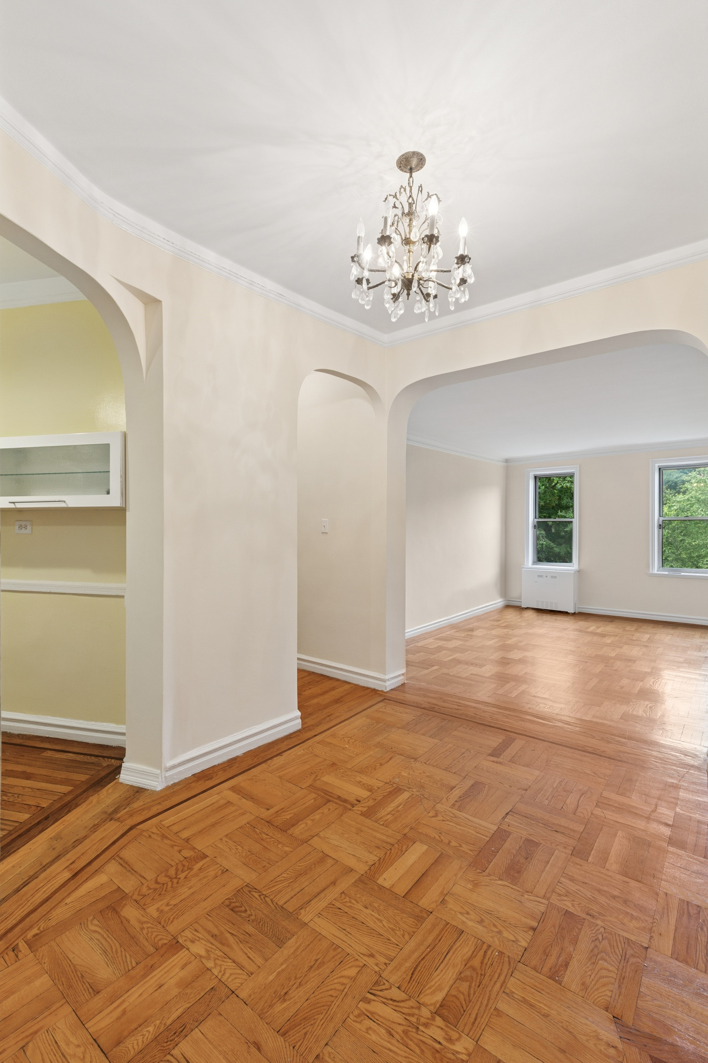 585 West 214th Street, Unit 4G Manhattan, NY 10034 - Photo 6 of 18 a view of an empty room with a window