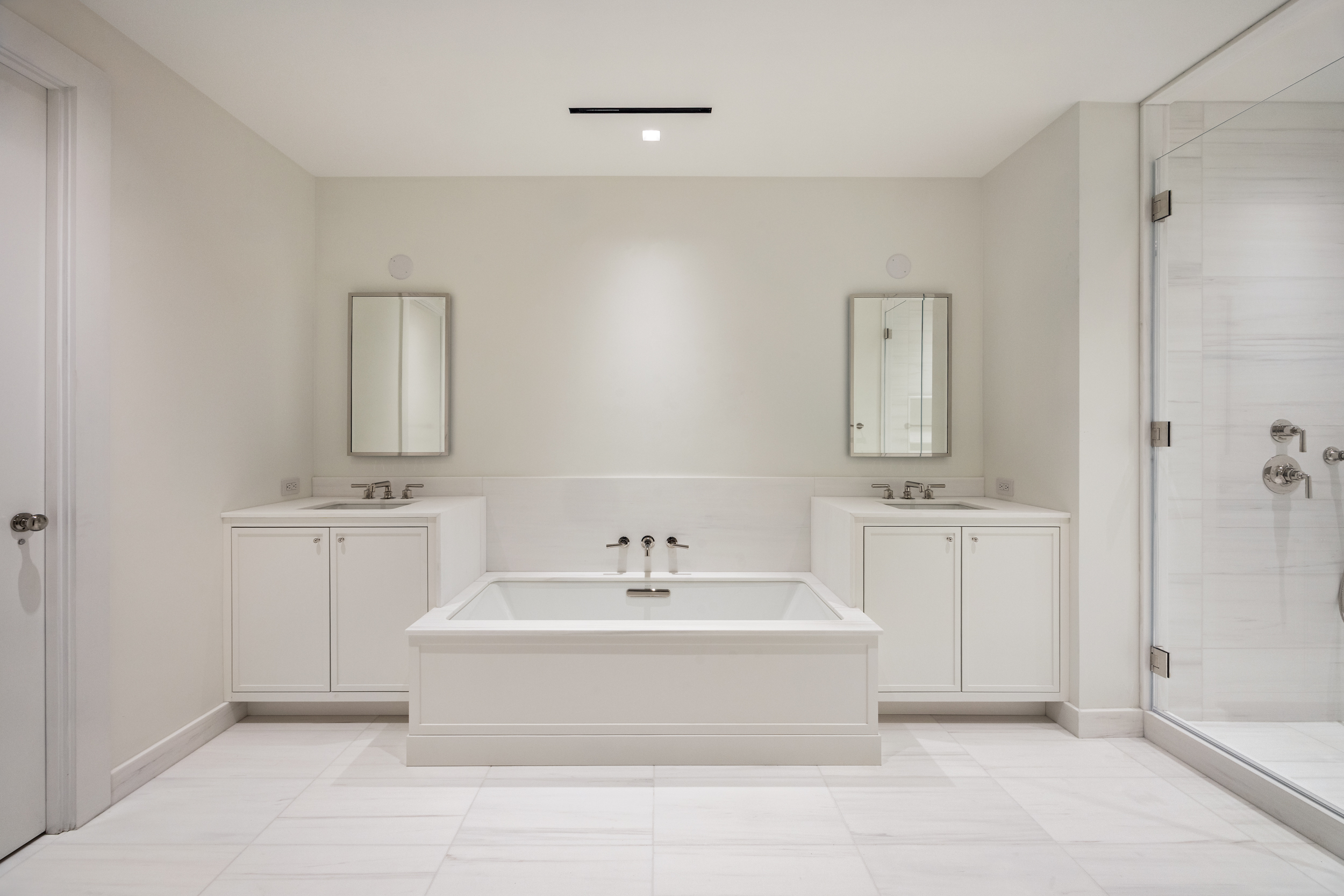 243 West Broadway, Unit 3 Manhattan, NY 10013 - Photo 14 of 25 a bathroom with a bathtub and a sink