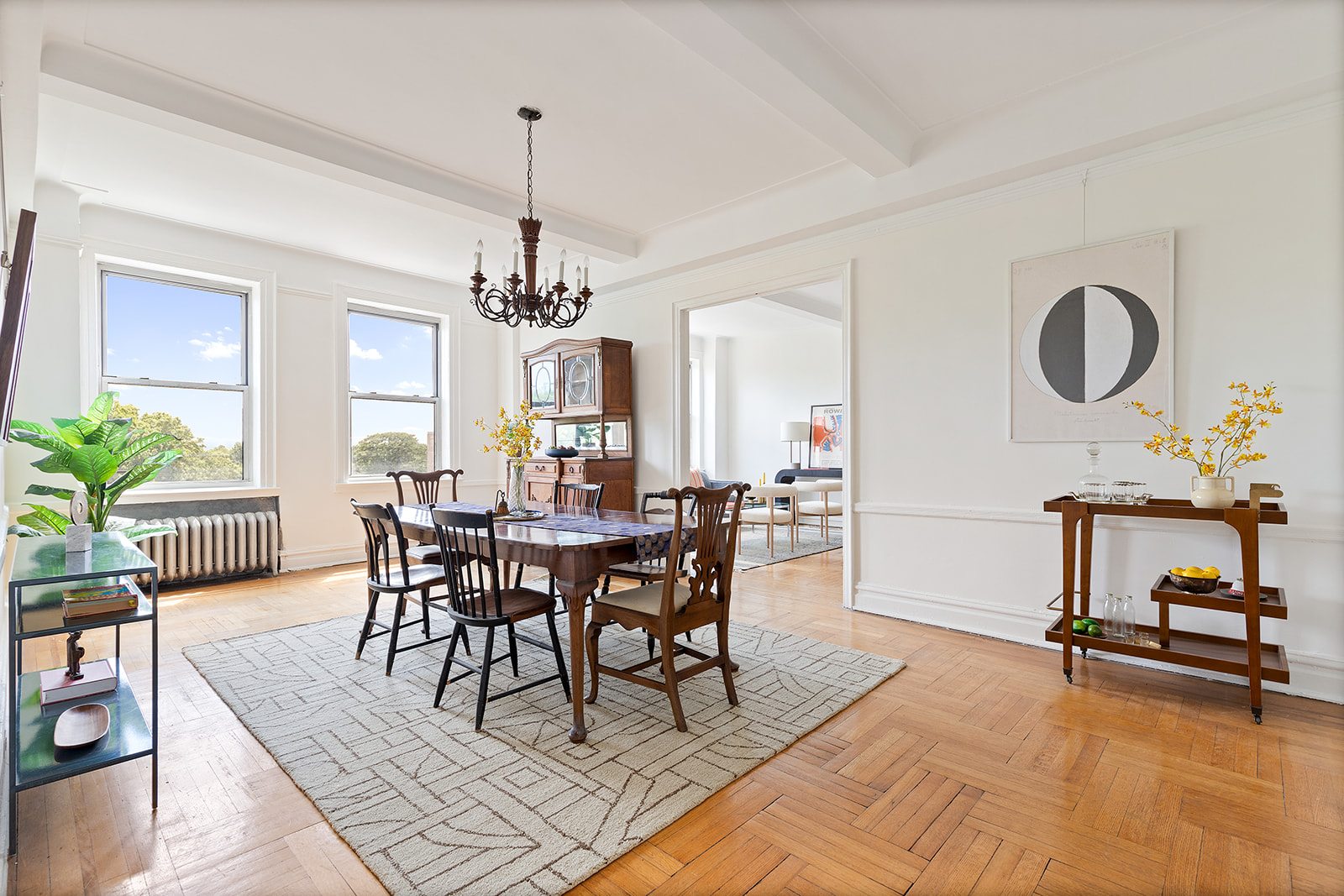 41 Eastern Parkway, Unit 8B Brooklyn, NY 11238 - Photo 4 of 13 a view of a dining room with furniture and a chandelier