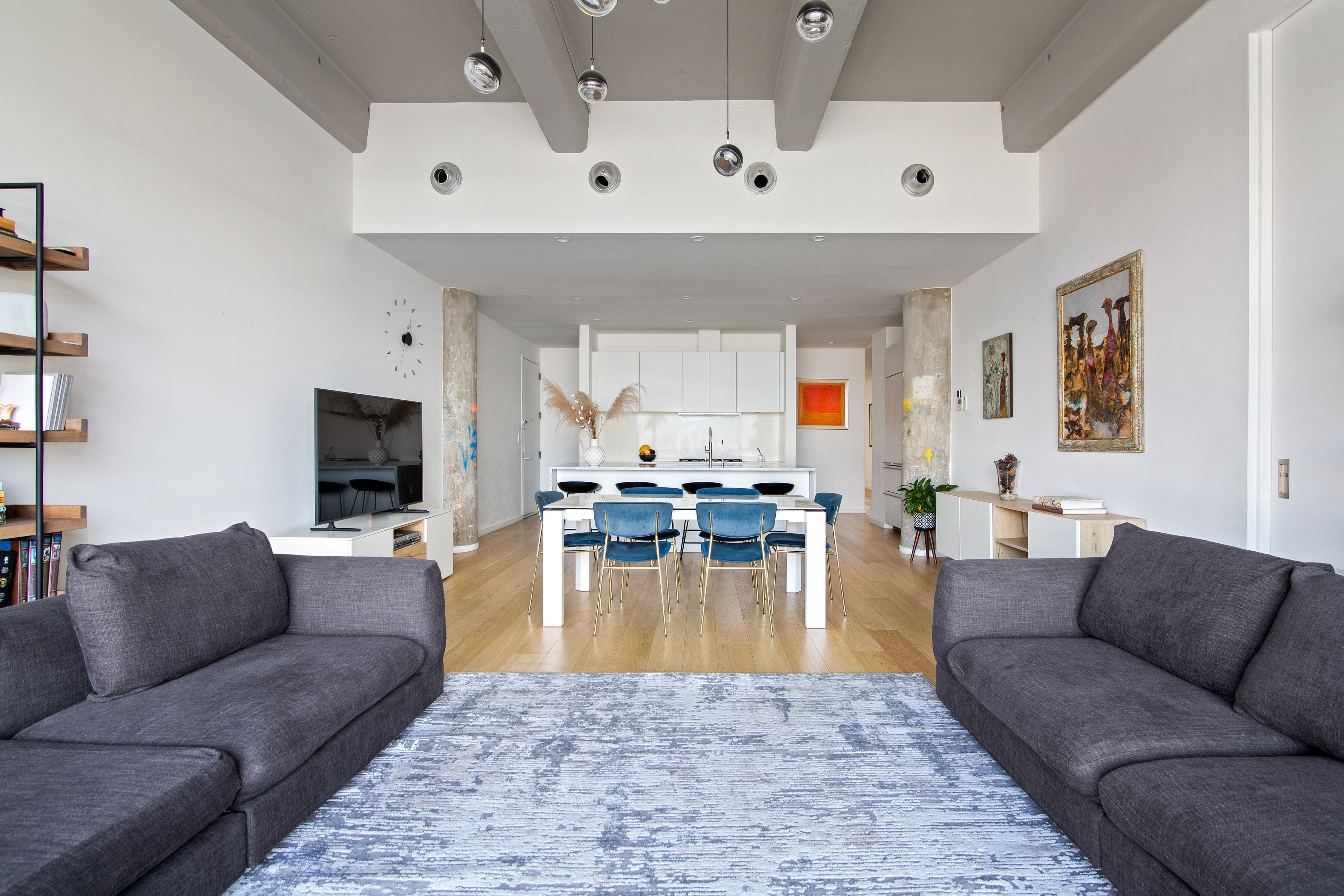 160 Imlay Street, Unit 4E2 Brooklyn, NY 11231 - Photo 2 of 8 a living room with furniture and a flat screen tv