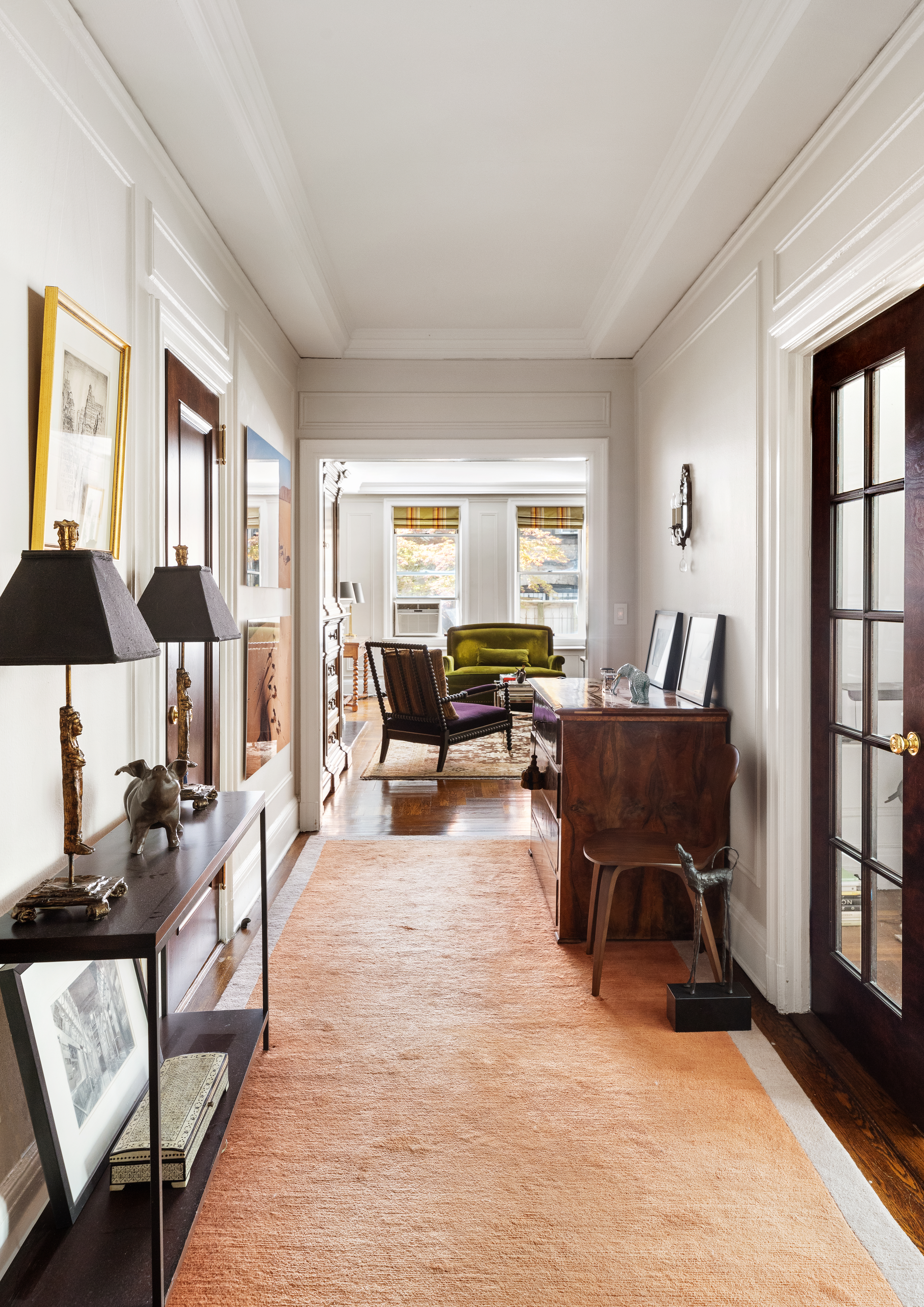173-175 Riverside Drive, Unit 2L Manhattan, NY 10024 - Photo 10 of 18 a living room with furniture and large windows