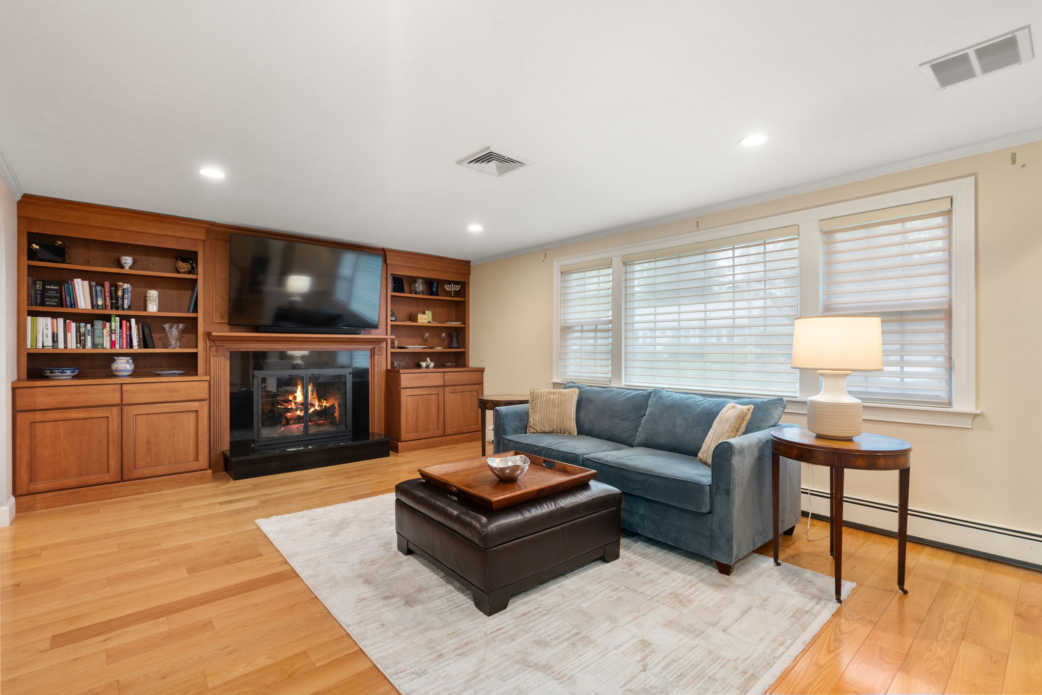4 Gage Road Wayland, MA 01778 - Photo 5 of 32 a living room with furniture and a flat screen tv