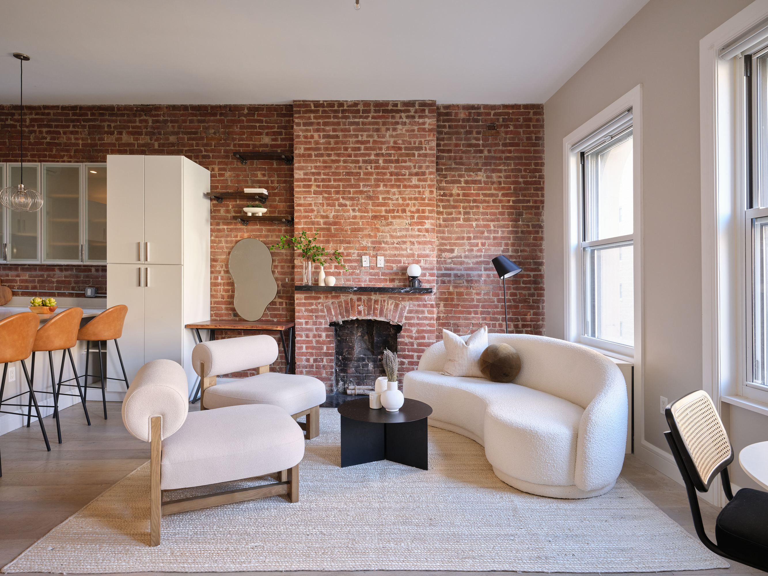 204 West 92nd Street, Unit PH5F Manhattan, NY 10025 - Photo 1 of 25 a living room with furniture and a fireplace