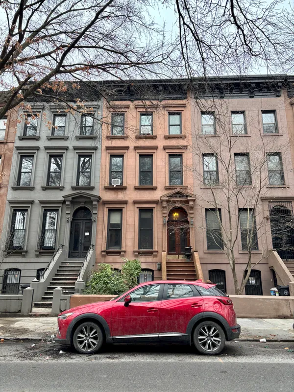 a car parked in front of a building
