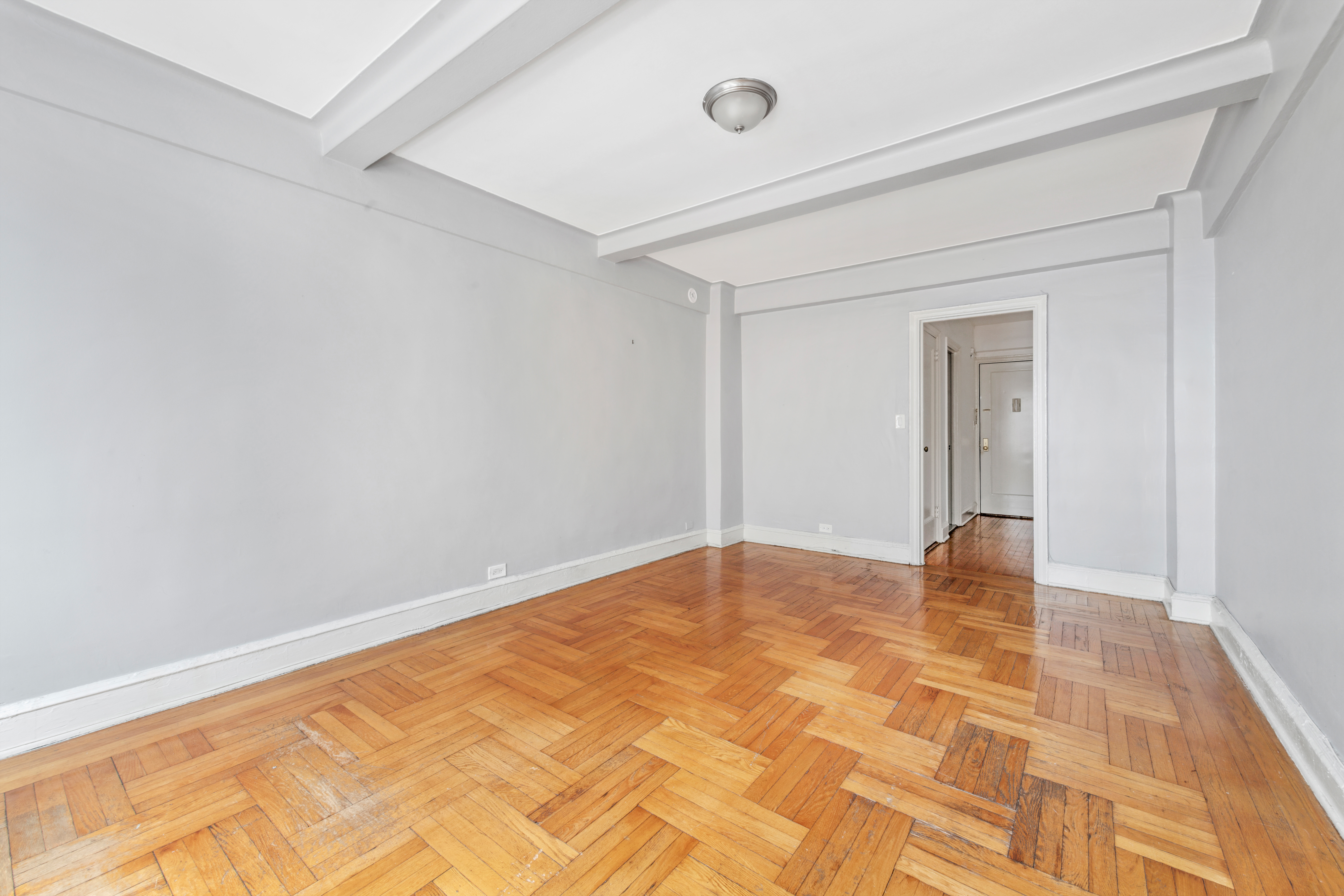 433 West 34th Street, Unit 8D Manhattan, NY 10001 - Photo 2 of 15 a view of an empty room