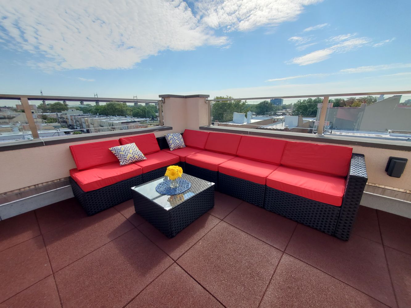 23-05 24th Avenue, Unit PHB Queens, NY 11102 - Photo 7 of 9 a sitting area with sitting on top of a road