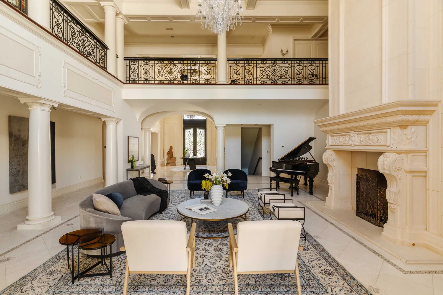 a view of a livingroom with furniture and a fireplace