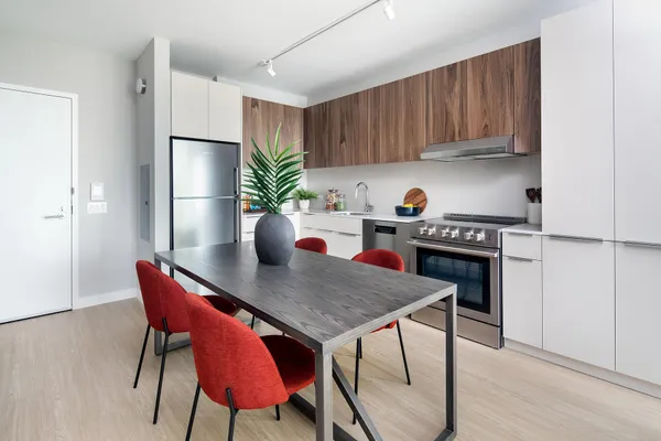 a table and chairs in a kitchen