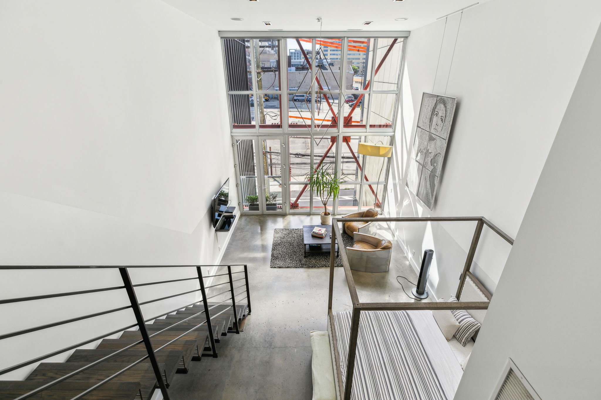 449 North 13th Street Philadelphia, PA 19123 - Photo 35 of 62 a view of staircase with two black and white walls