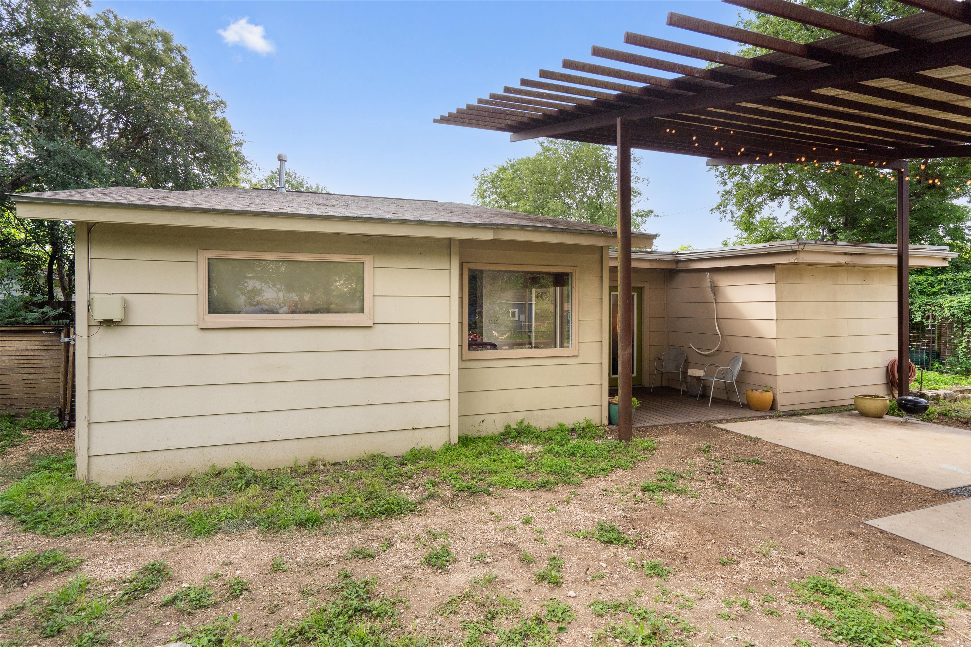 4614 Jinx Avenue Austin, TX 78745 - Photo 36 of 40 a view of a house with a yard