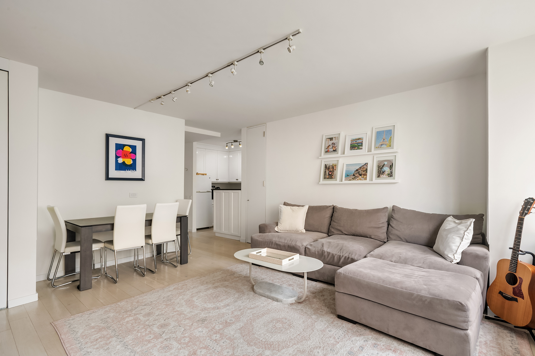 330 East 75th Street, Unit 3L Manhattan, NY 10021 - Photo 3 of 14 a living room with furniture and a couch