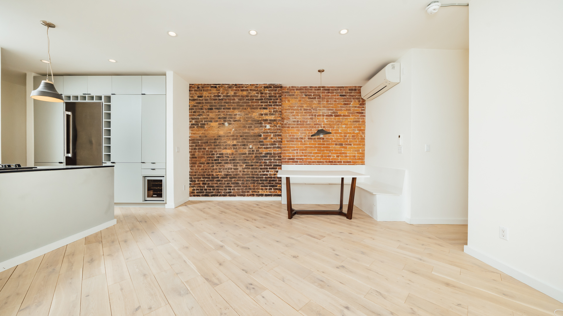880 Woodward Avenue, Unit 2 Queens, NY 11385 - Photo 9 of 18 a view of a livingroom with furniture and a window