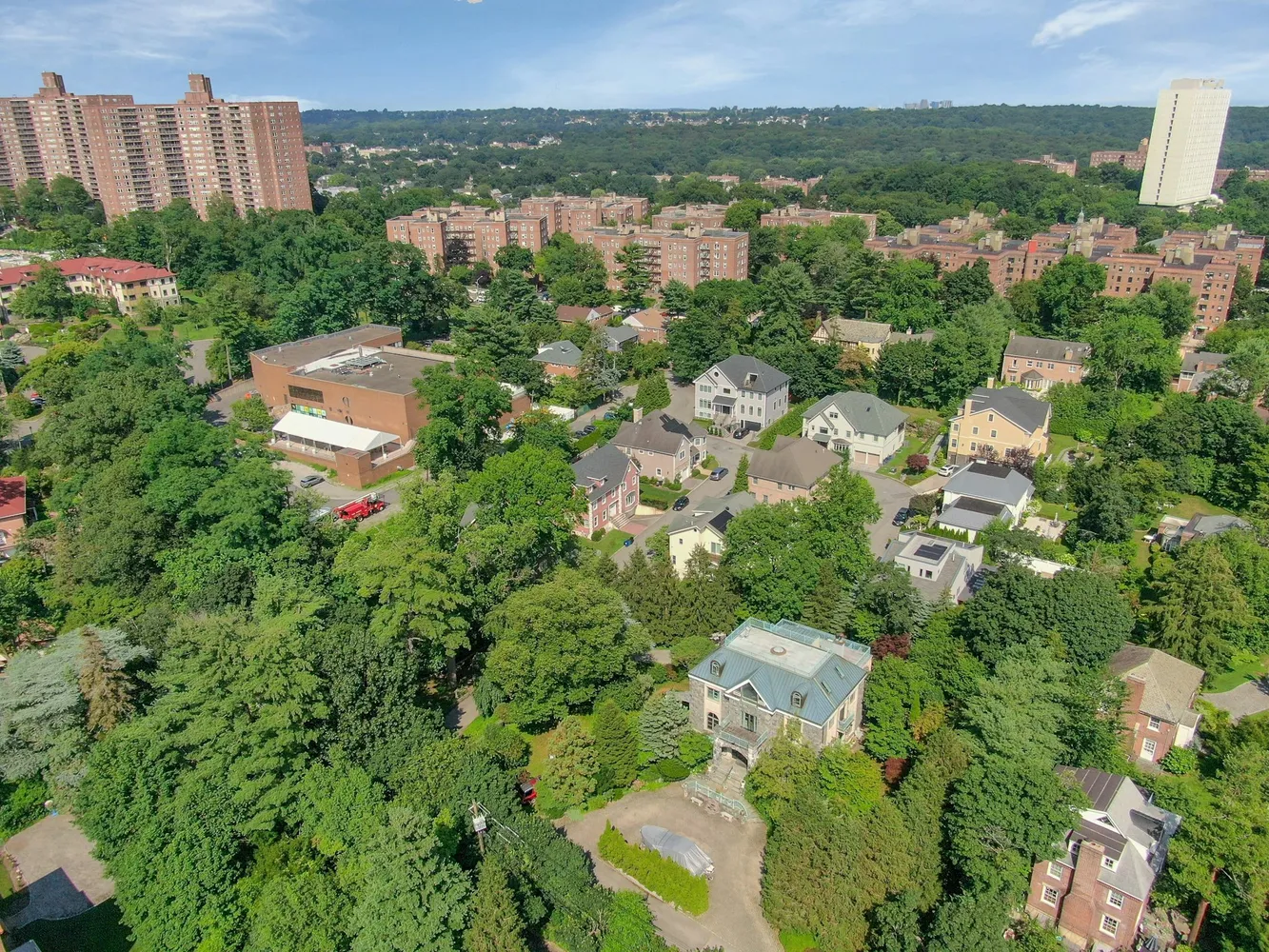 an aerial view of a house with a garden