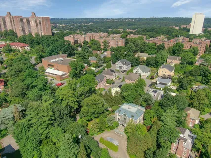 an aerial view of a house with a garden