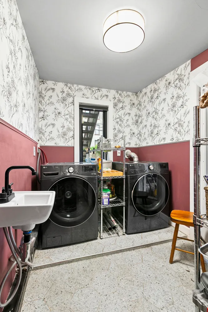 a kitchen with a stove and a stove