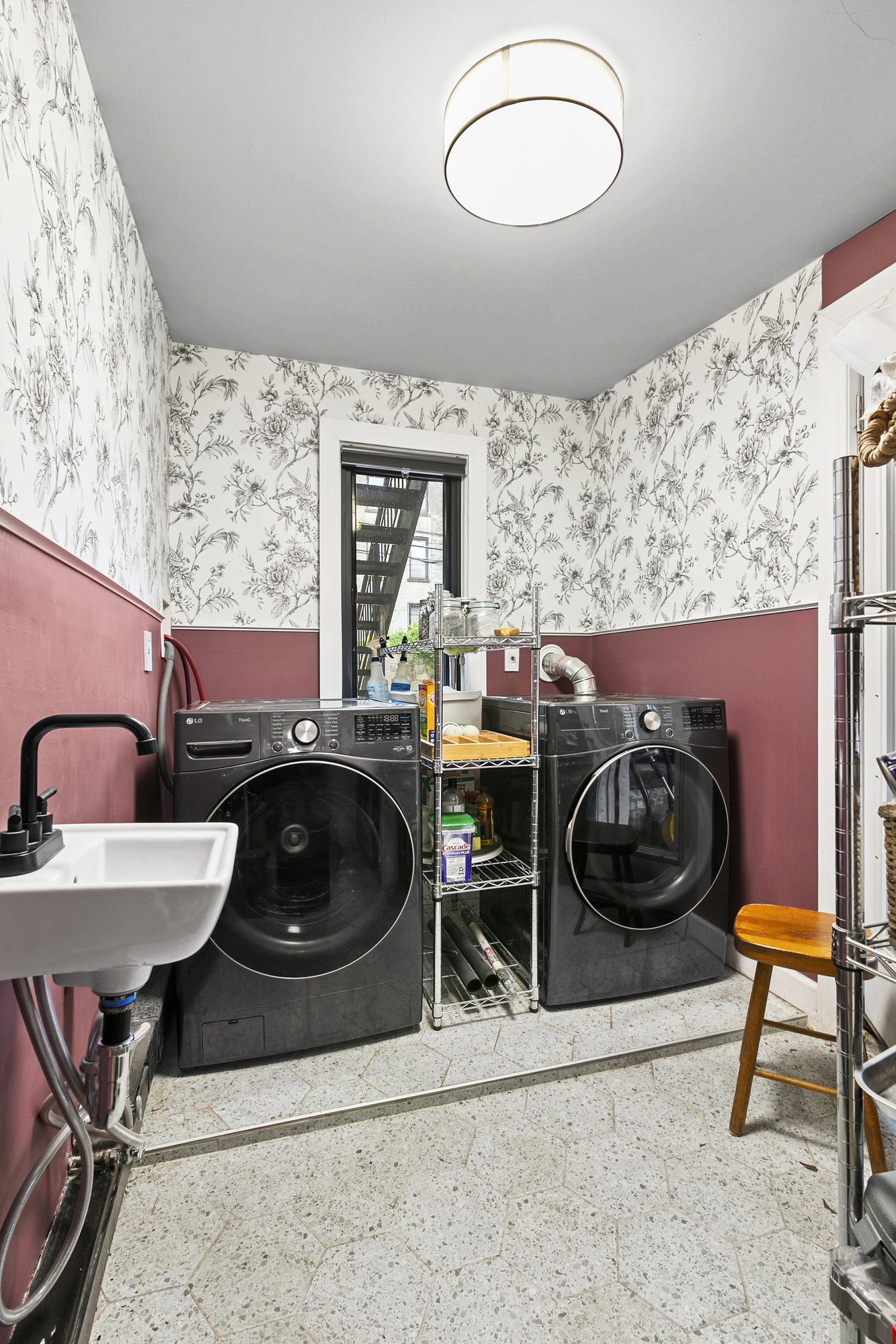 555 MacDonough Street, Unit 1 Brooklyn, NY 11233 - Photo 4 of 7 a kitchen with a stove and a stove