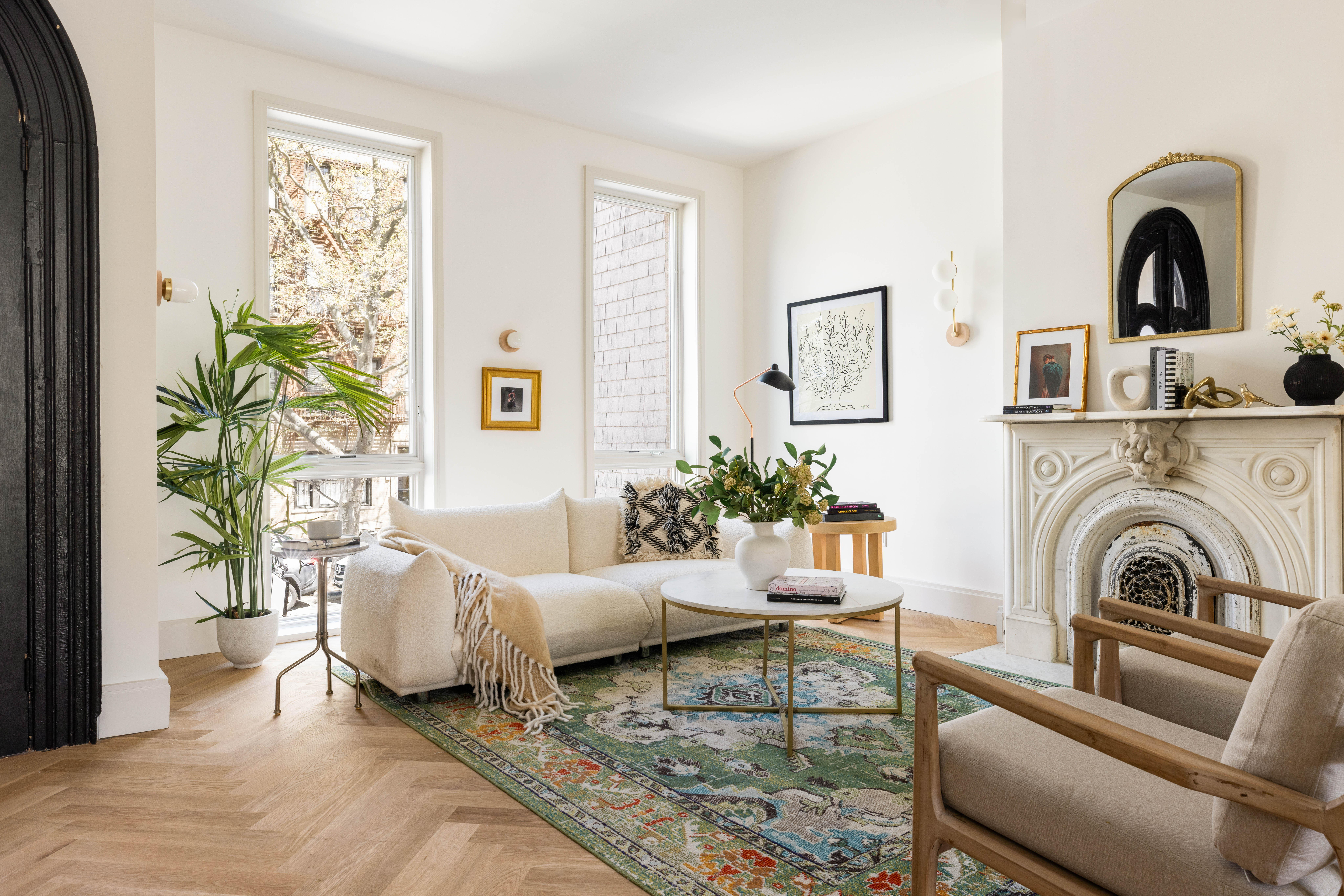 196 Monroe Street Brooklyn, NY 11216 - Photo 3 of 22 a living room with furniture and potted plants