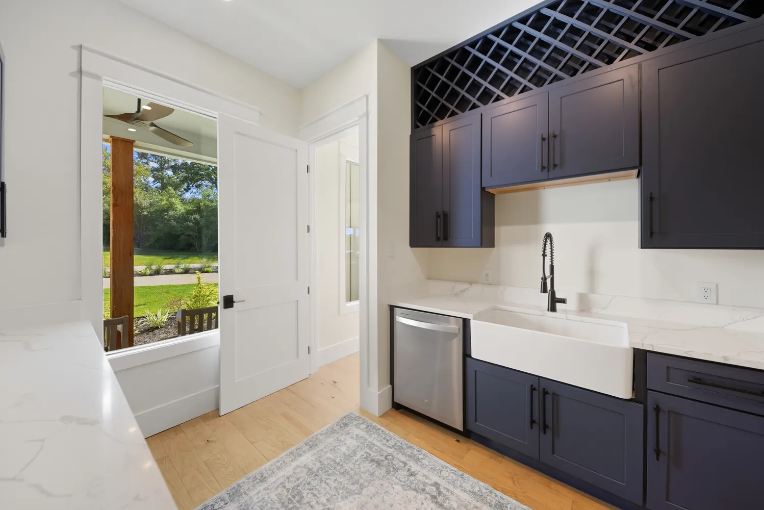 a kitchen with a sink and a refrigerator