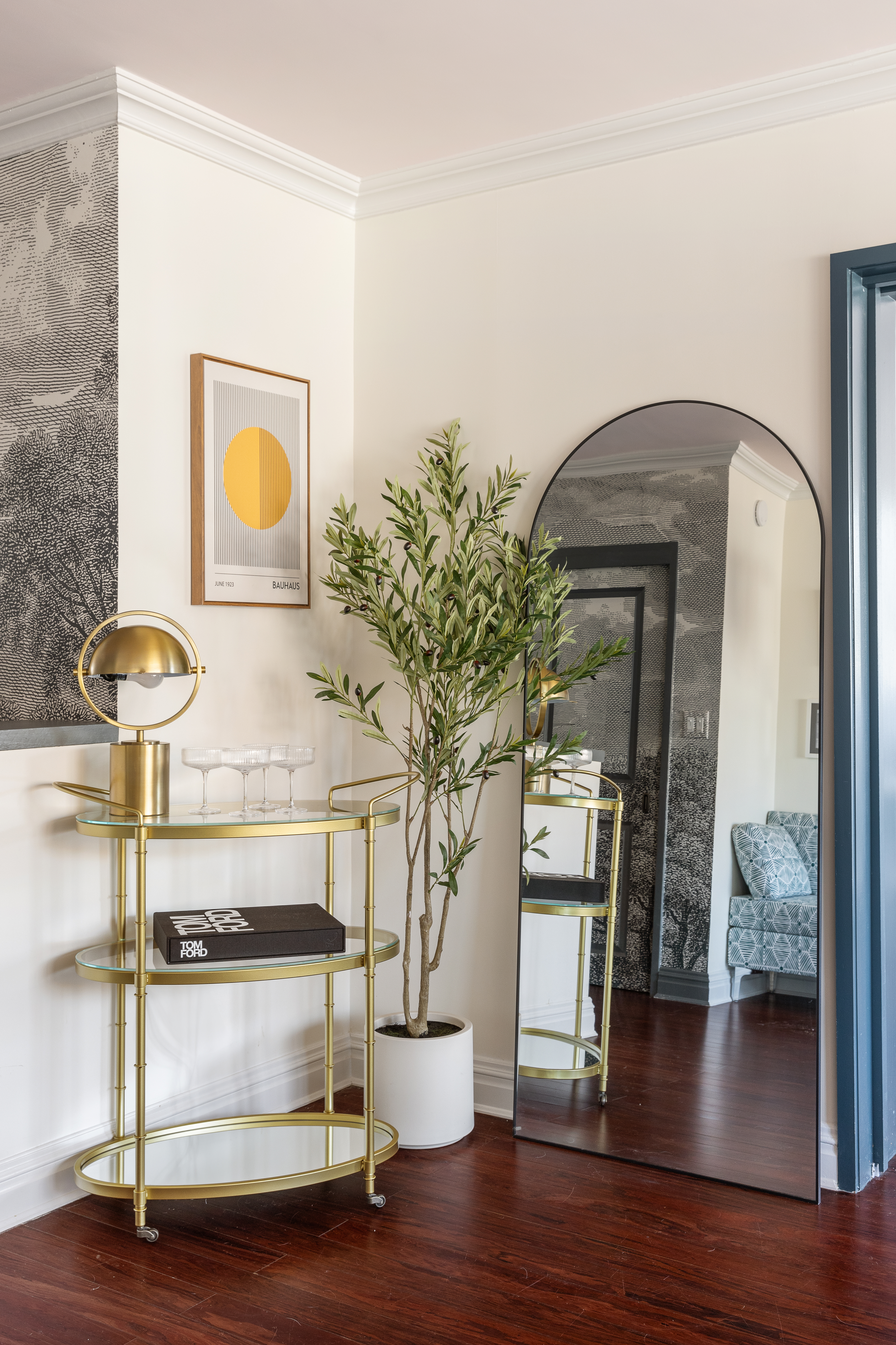 14 Horatio Street, Unit 11F Manhattan, NY 10014 - Photo 5 of 16 a living room with wooden floor and potted plant