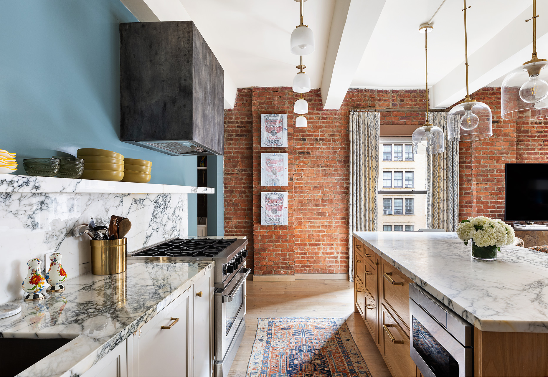 380 West 12th Street, Unit 6CD Manhattan, NY 10014 - Photo 6 of 19 a kitchen with stainless steel appliances granite countertop a sink stove and refrigerator