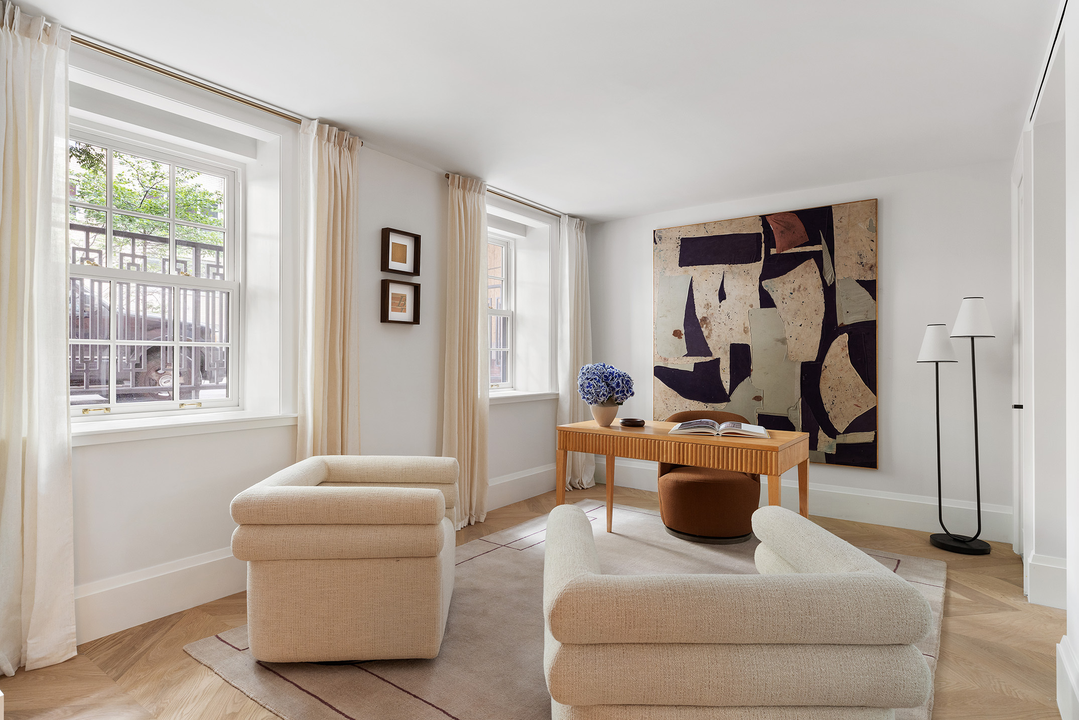 17 East 9th Street Manhattan, NY 10003 - Photo 25 of 32 a living room with furniture and a window