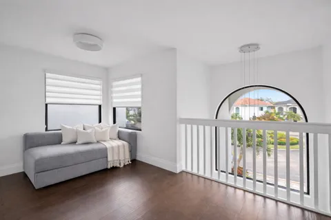 a bedroom with a bed and a table in it