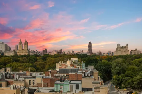 a view of a city with a city skyline in the background