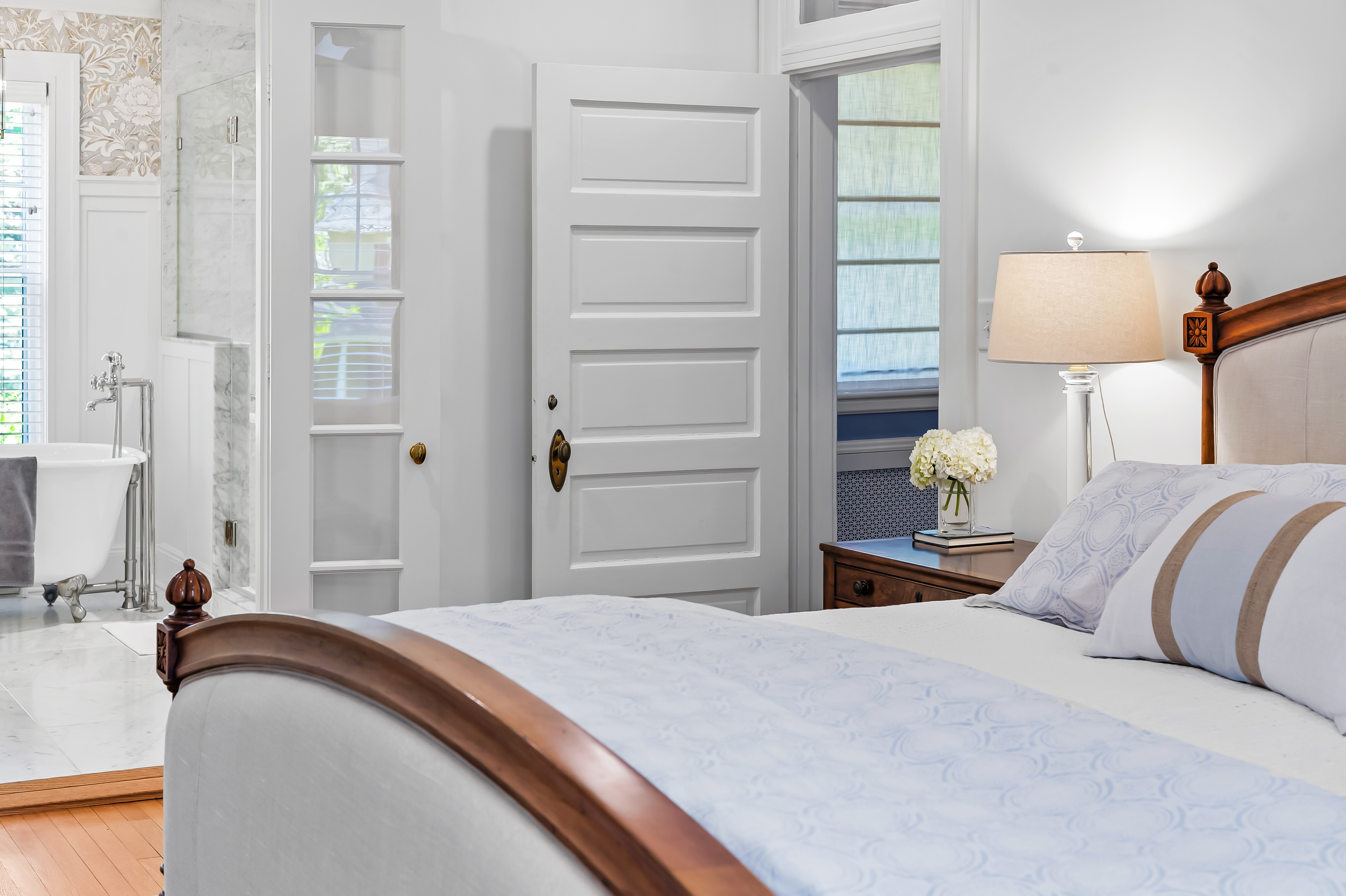 6 Elmhurst Road Baltimore, MD 21210 - Photo 64 of 100 a bedroom with a bed and a lamp
