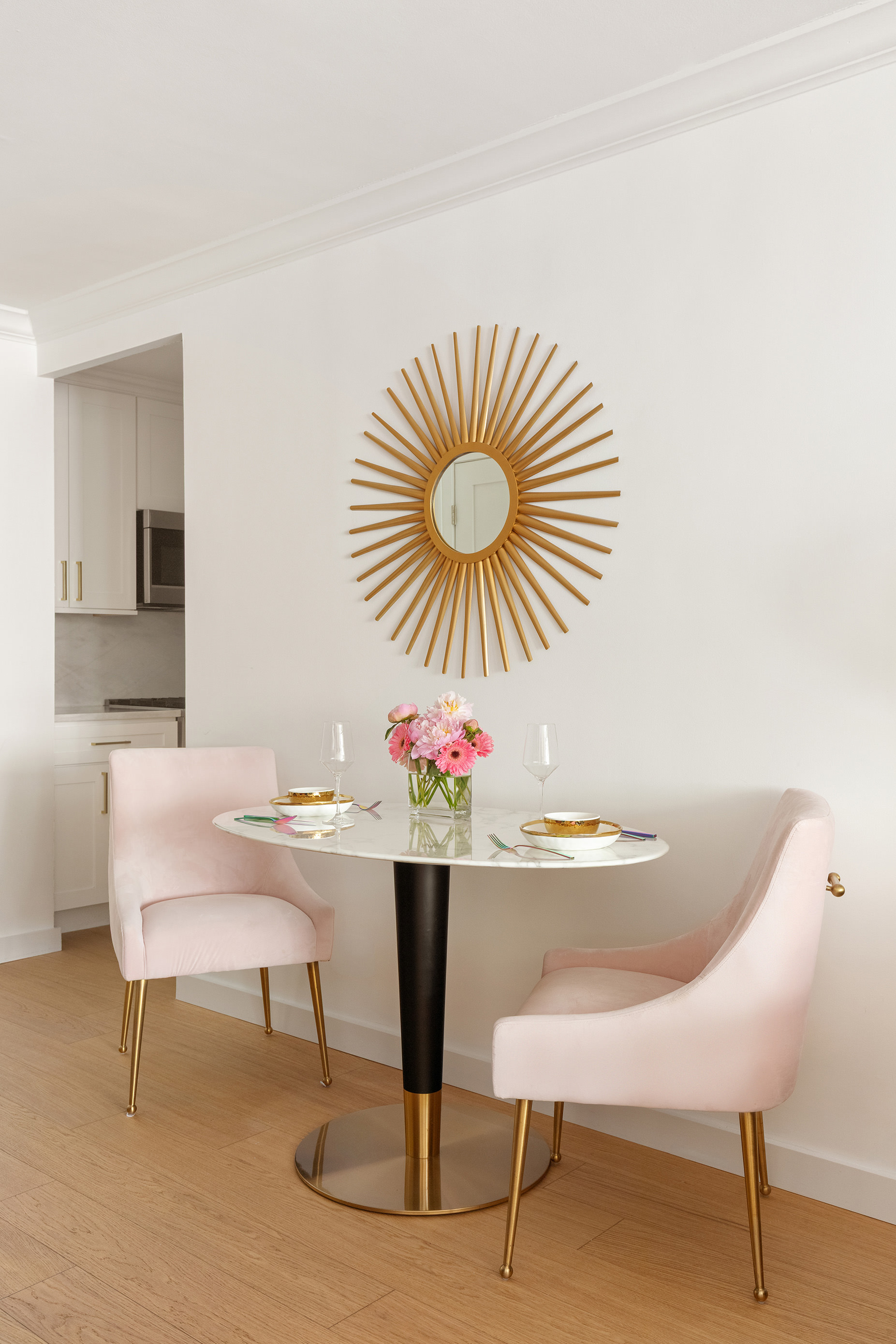 16 West 16th Street, Unit 12KN Manhattan, NY 10011 - Photo 4 of 8 a view of a dining room with furniture and wooden floor