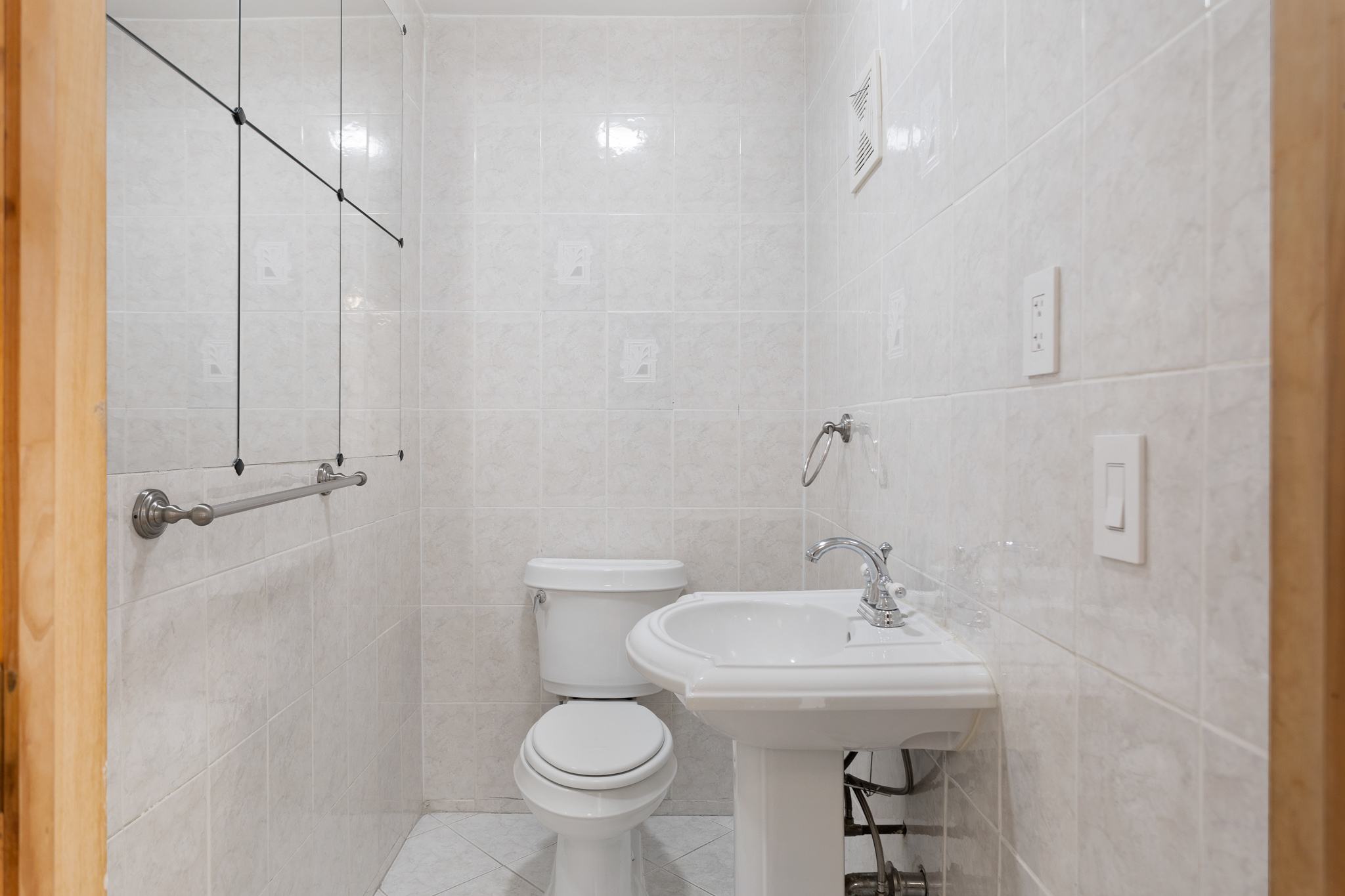 91-22 92nd Street Queens, NY 11421 - Photo 8 of 27 a bathroom with a sink toilet and shower