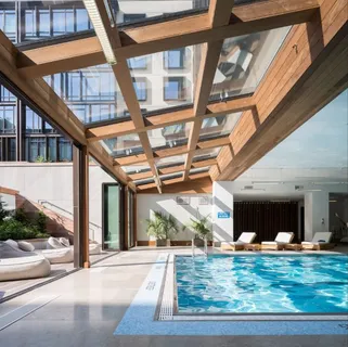 a view of swimming pool with a outdoor seating