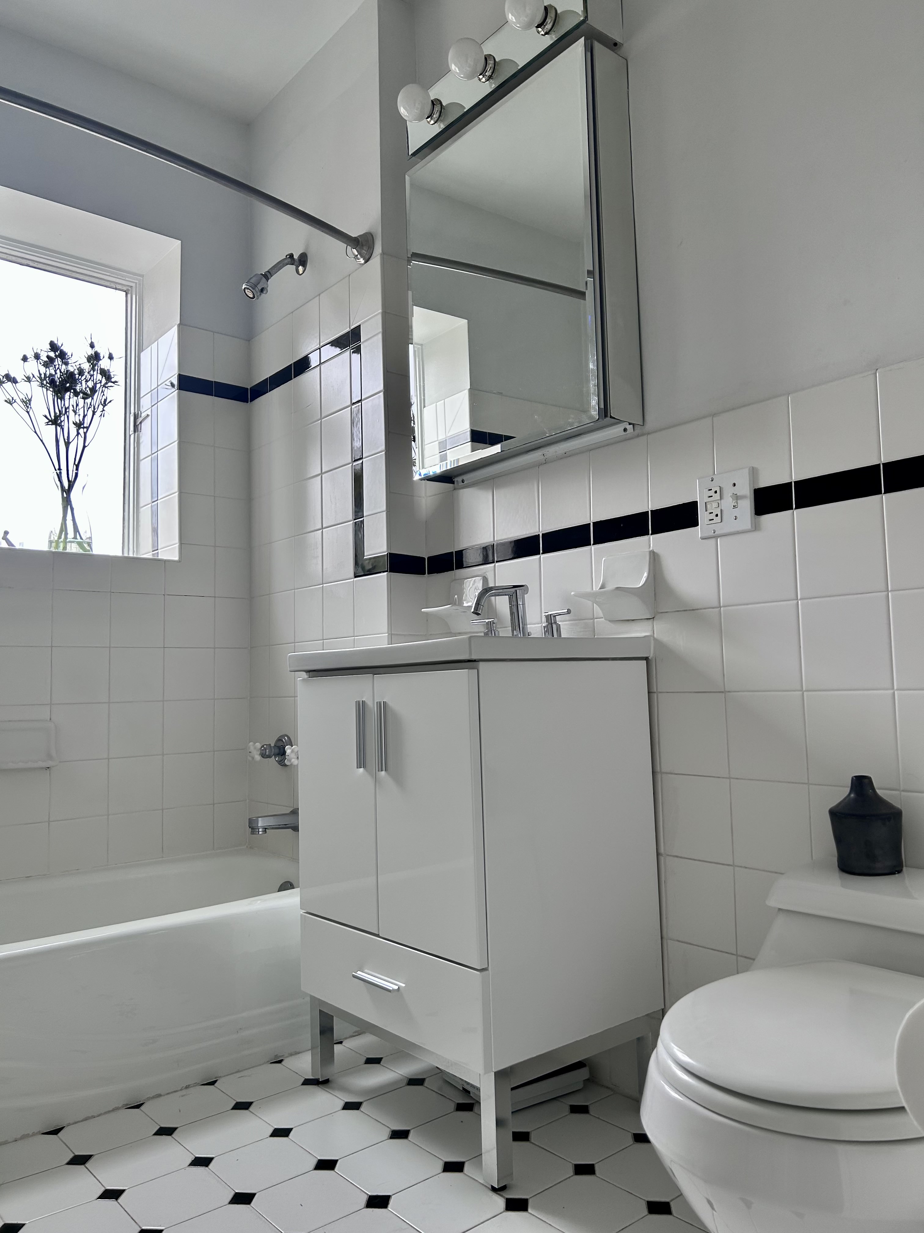173 Garfield Place Brooklyn, NY 11215 - Photo 5 of 14 a bathroom with a sink a toilet and shower