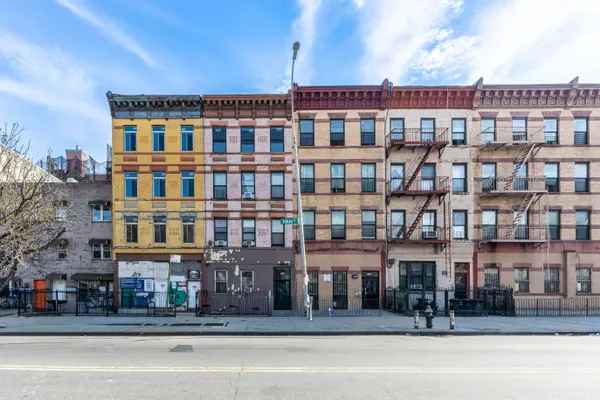 a front view of a building with street view