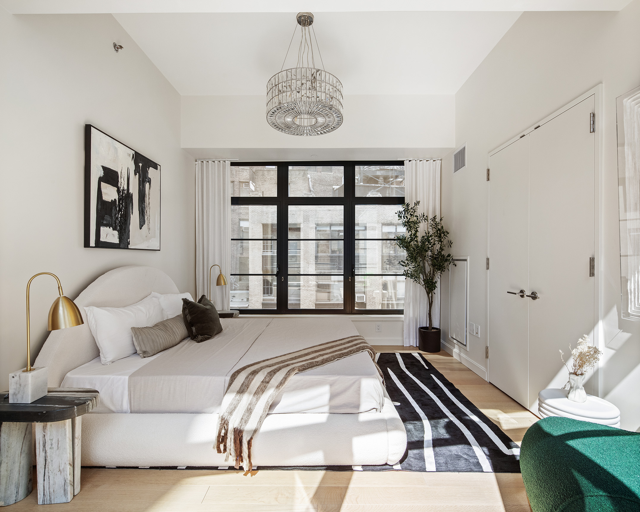 50 West 30th Street, Unit 3E Manhattan, NY 10001 - Photo 5 of 9 a spacious bedroom with a bed and a window