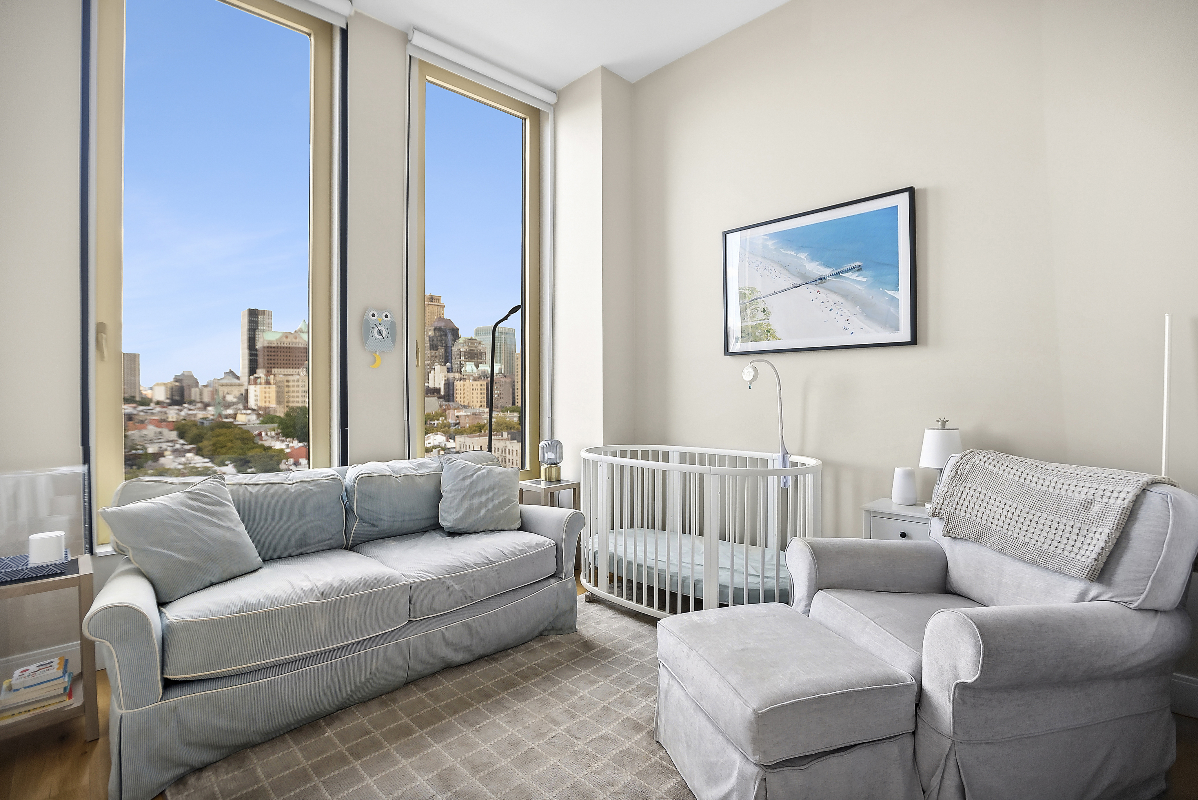 347 Henry Street, Unit 12A Brooklyn, NY 11201 - Photo 10 of 26 a living room with furniture and a large window