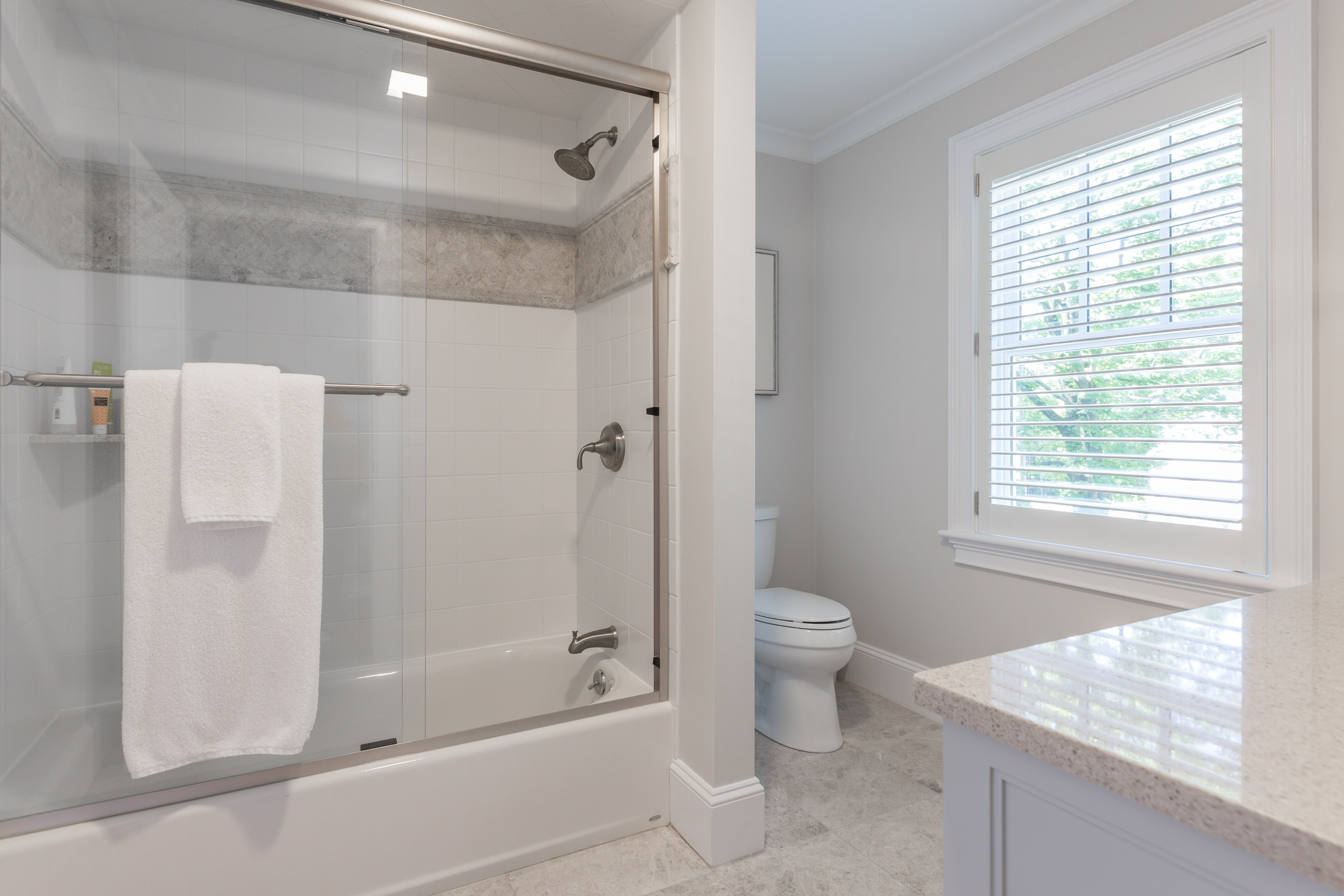 9 Wynnewood Road Wellesley Hills, MA 02481 - Photo 21 of 27 a bathroom with a granite countertop shower a toilet and a sink