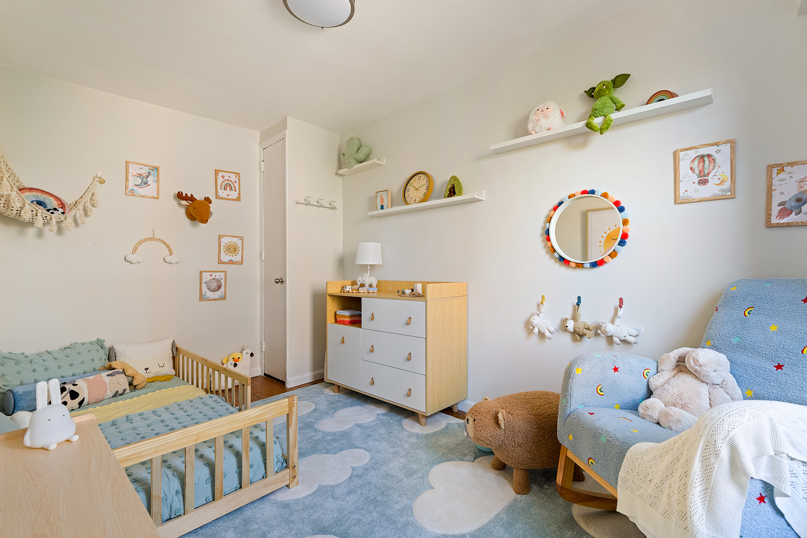 350 Ocean Parkway, Unit 3M Brooklyn, NY 11218 - Photo 5 of 10 a bedroom with a bed and couch