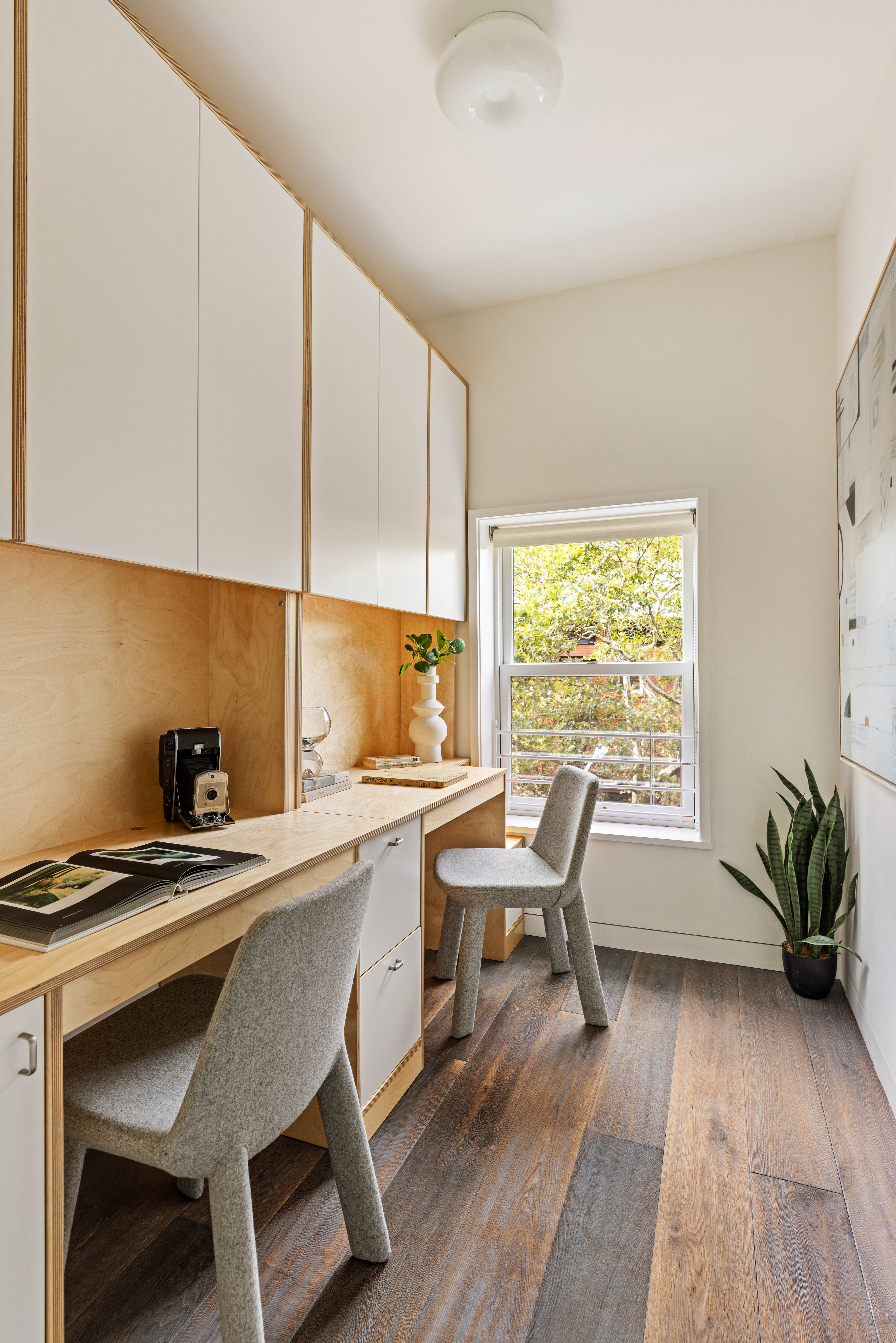 229 Dean Street Brooklyn, NY 11217 - Photo 20 of 23 a kitchen with a table chairs a sink and a stove