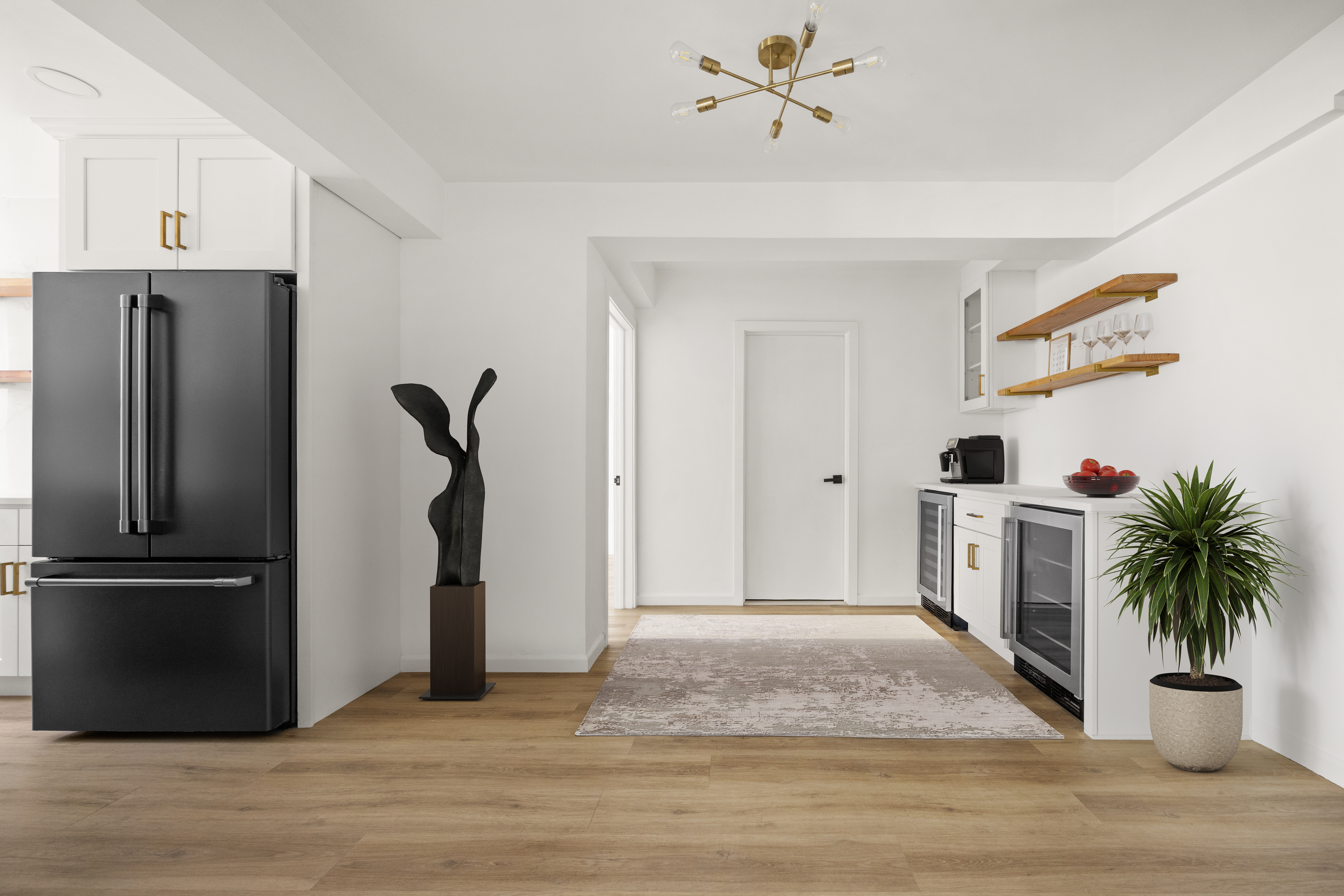 135 East 54th Street, Unit 11G Manhattan, NY 10022 - Photo 4 of 7 a living room with furniture and a potted plant