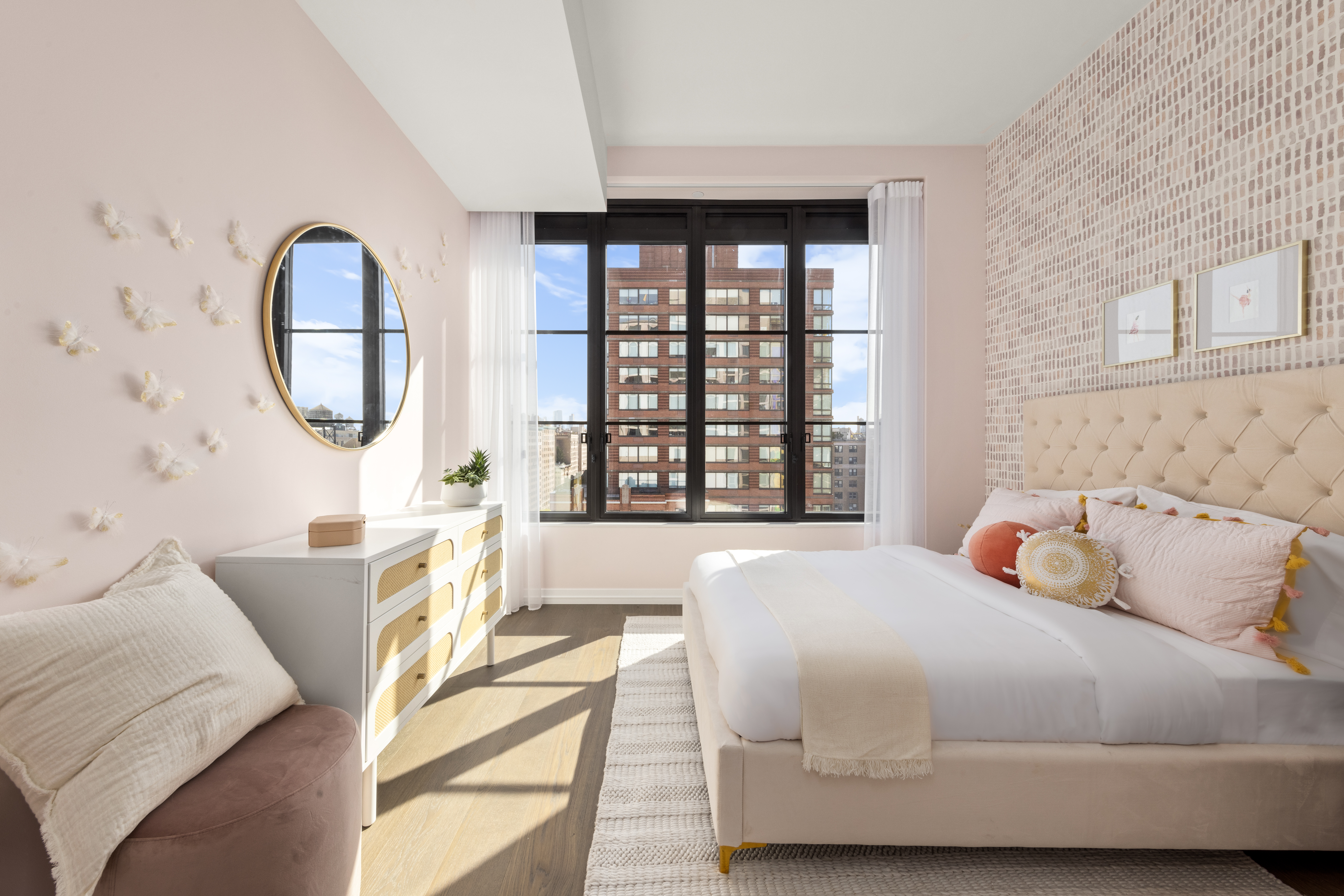 250 West 96th Street, Unit 17D Manhattan, NY 10025 - Photo 12 of 30 a bedroom with a bed a couch and a large window