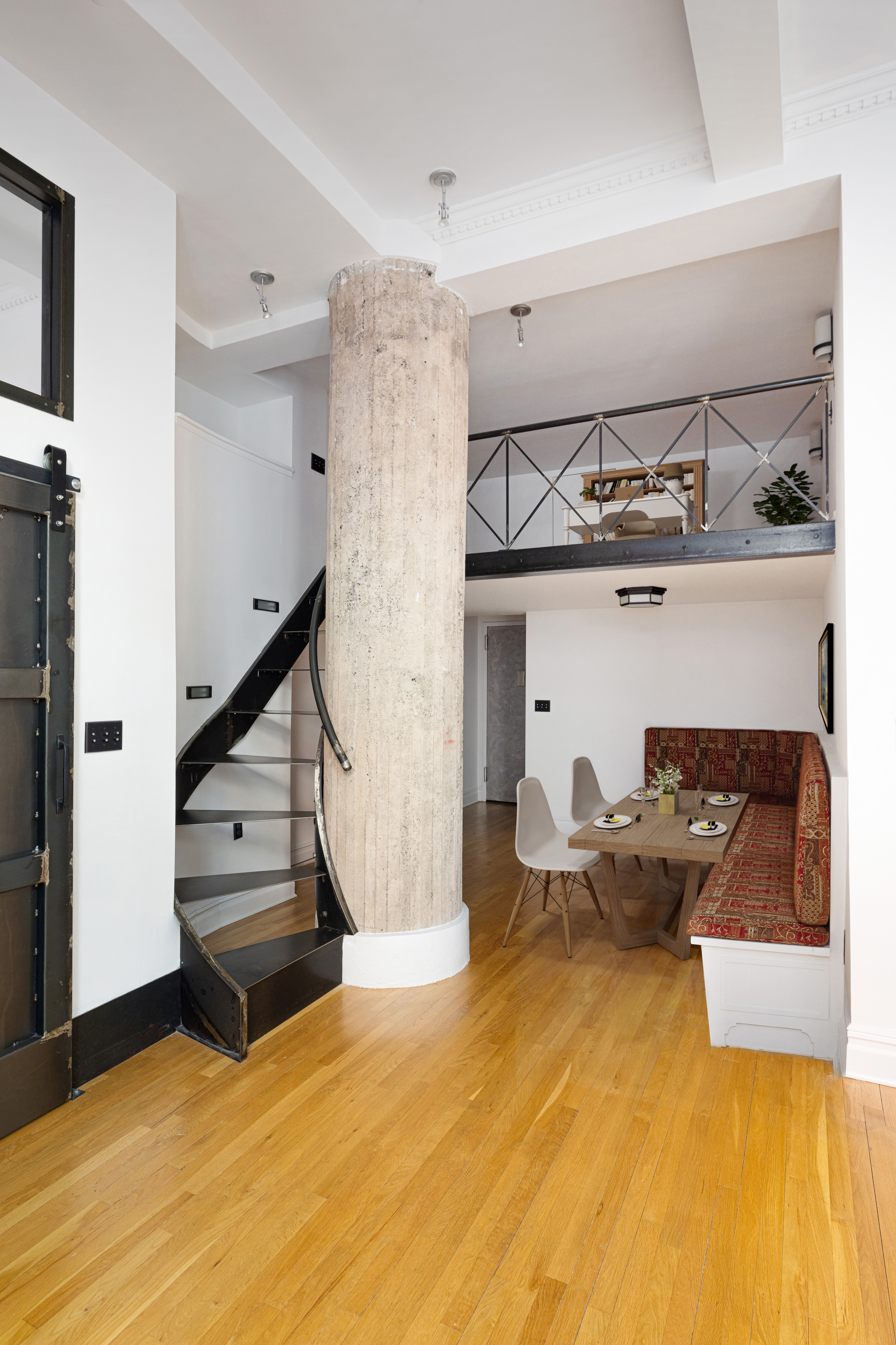 250 Mercer Street, Unit B203 Manhattan, NY 10012 - Photo 5 of 19 a living room with furniture and a fireplace