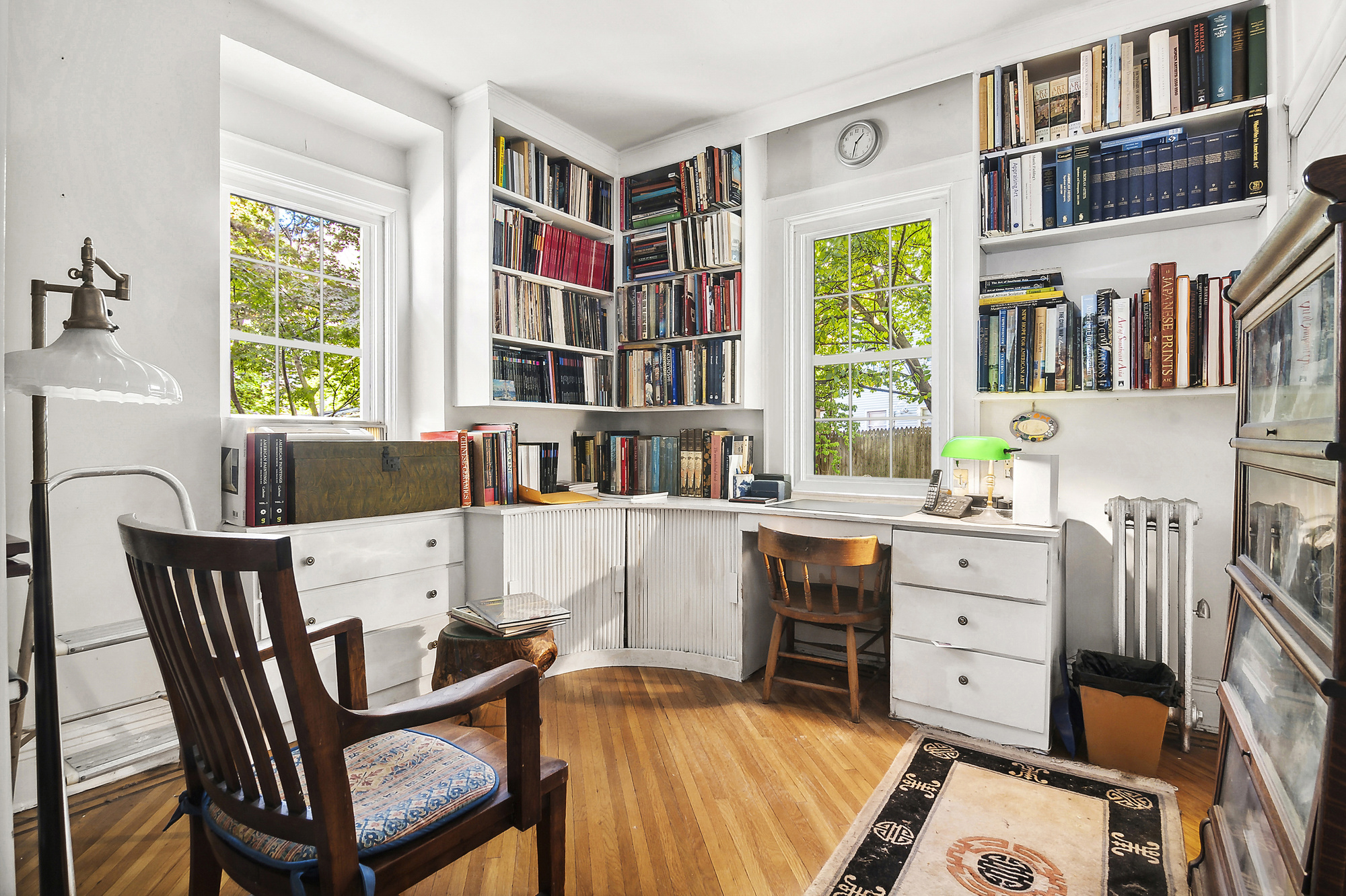 819 East 19th Street Brooklyn, NY 11230 - Photo 6 of 16 a view of a workspace with furniture and a window